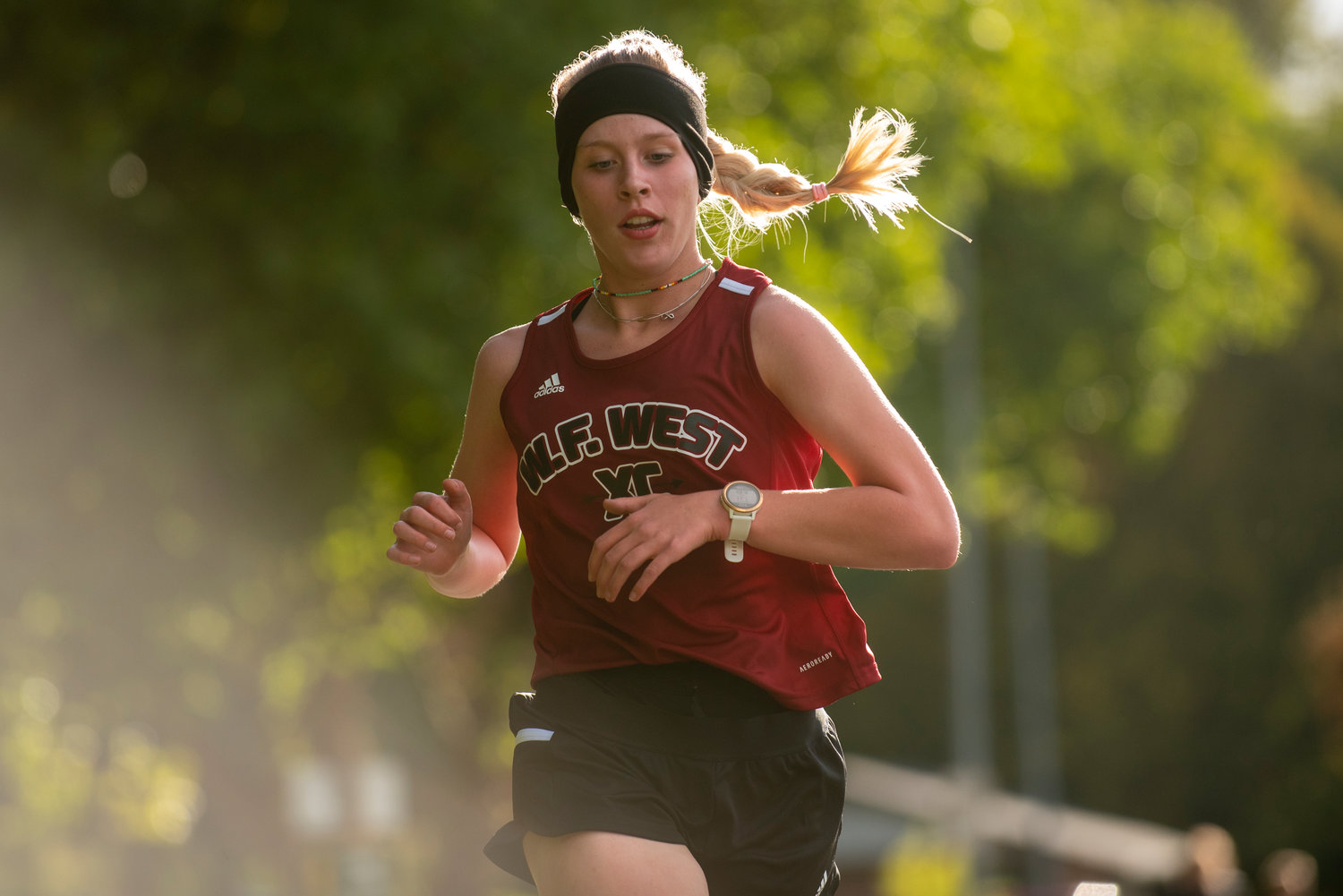 W.F. West's Cadence Edminster races in a dual cross country meet at Stan Hedwall Park on Wednesday, Oct. 6, 2021.