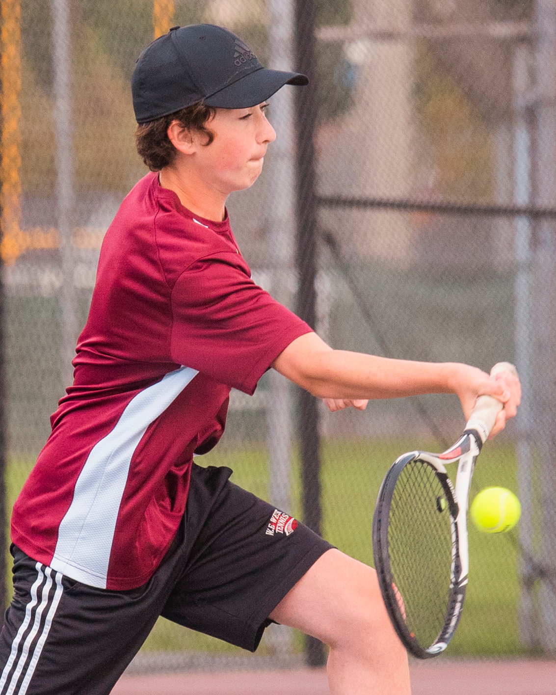 W.F. West’s Bryce Kuykendall watches the ball into his racquet during a match in Chehalis Wednesday afternoon.