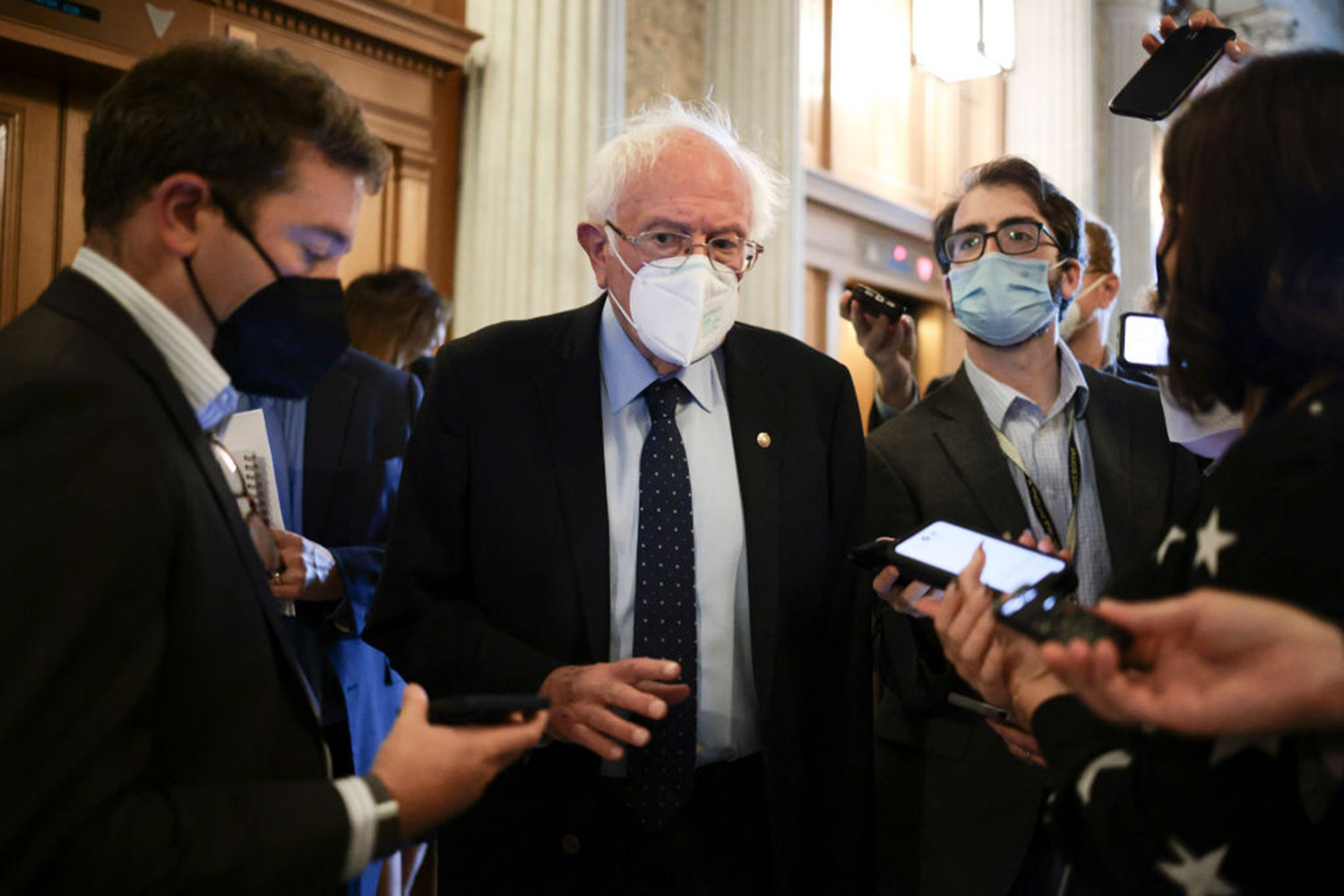 Sen. Bernie Sanders (I-VT) speaks to reporters as he arrives to the Senate Chambers during a series of votes in the U.S. Capitol Building on Oct. 6, 2021 in Washington, DC. (Anna Moneymaker/Getty Images/TNS)