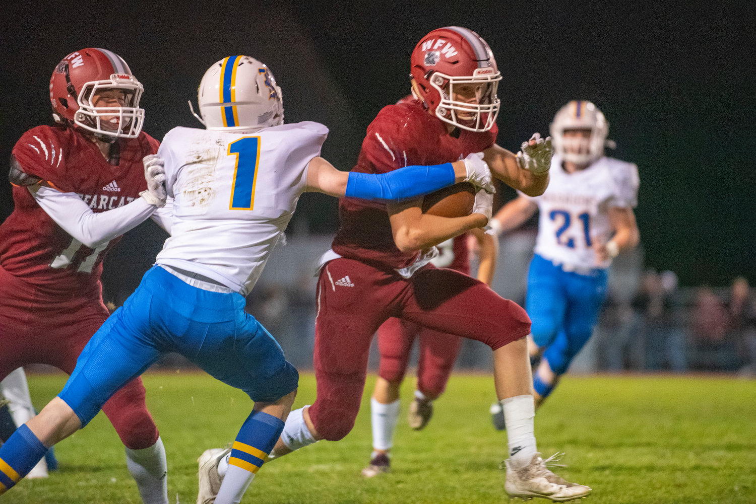 W.F. West running back Jacob Fuller (2) slips past Rochester corner Ashton Rodriguez (1) during a 2A Evergreen Conference matchup in Chehalis on Oct. 8, 2021.