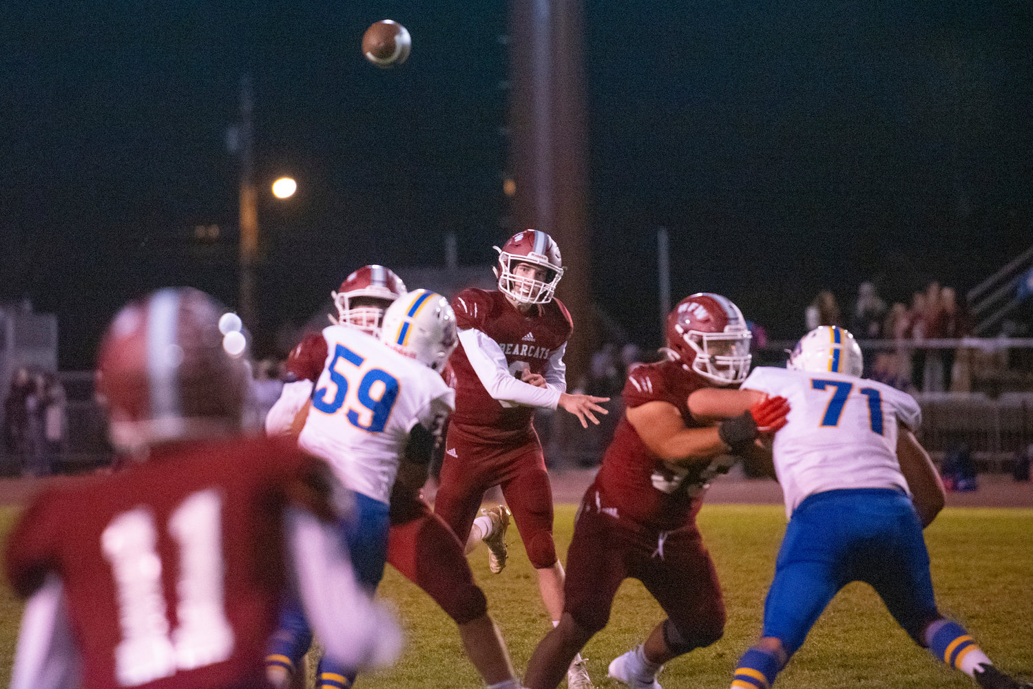 W.F. West quarterback Gavin Fugate (9) fires a pass to Cameron Amoroso (11) against Rochester on Oct. 8, 2021.