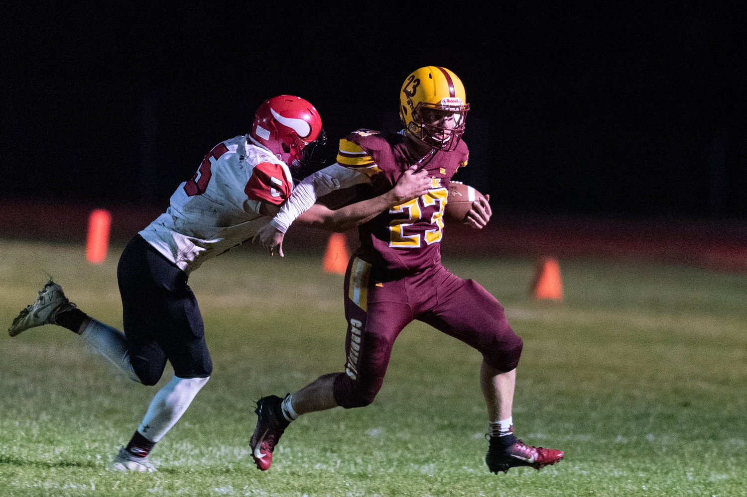 Winlock quarterback Neal Patching powers through a tackle in the Cardinals win over Mossyrock Oct. 8.