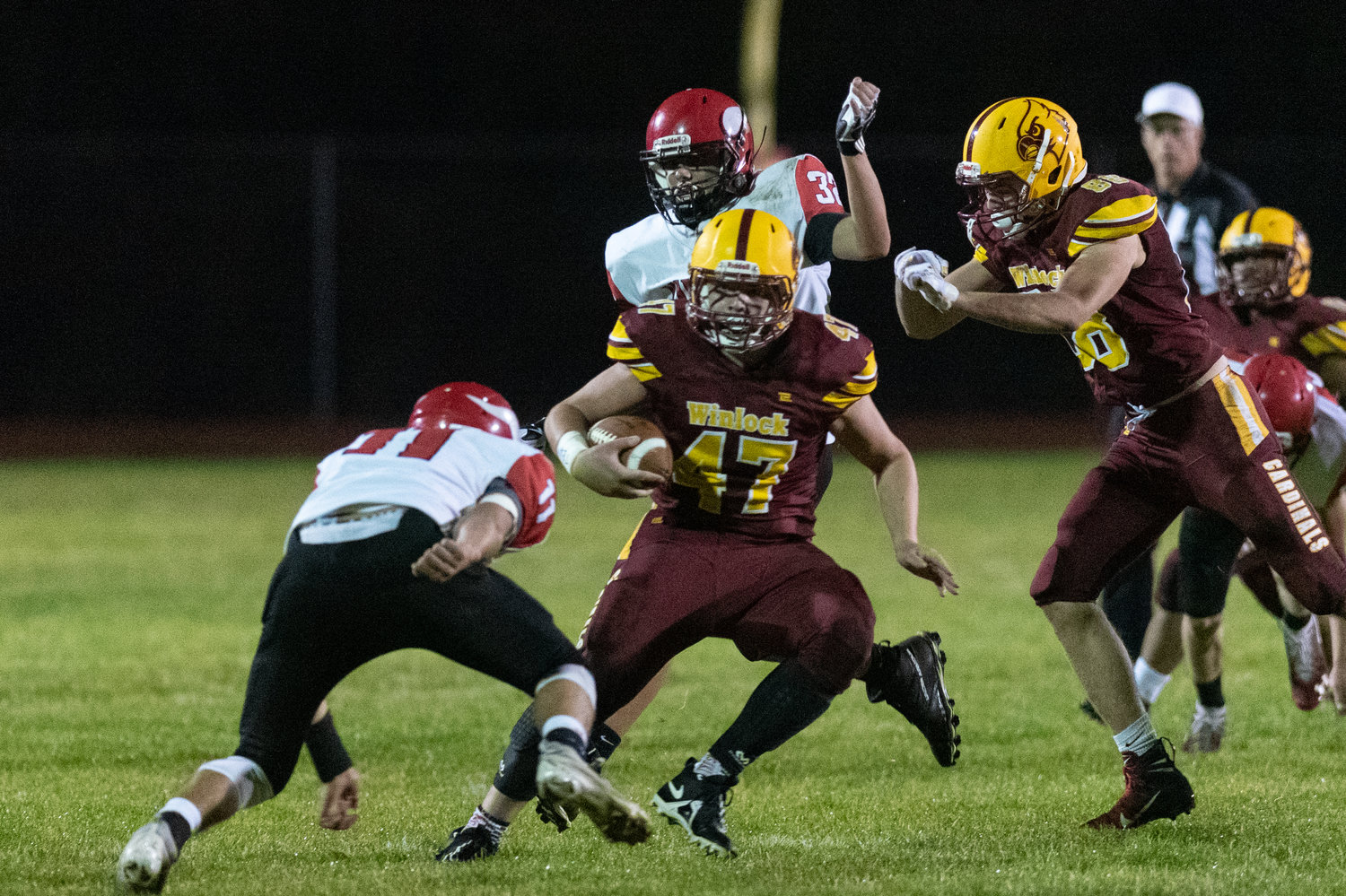 Winlock tailback Nolan Swofford breaks a tackle against Mossyrock Oct. 8.