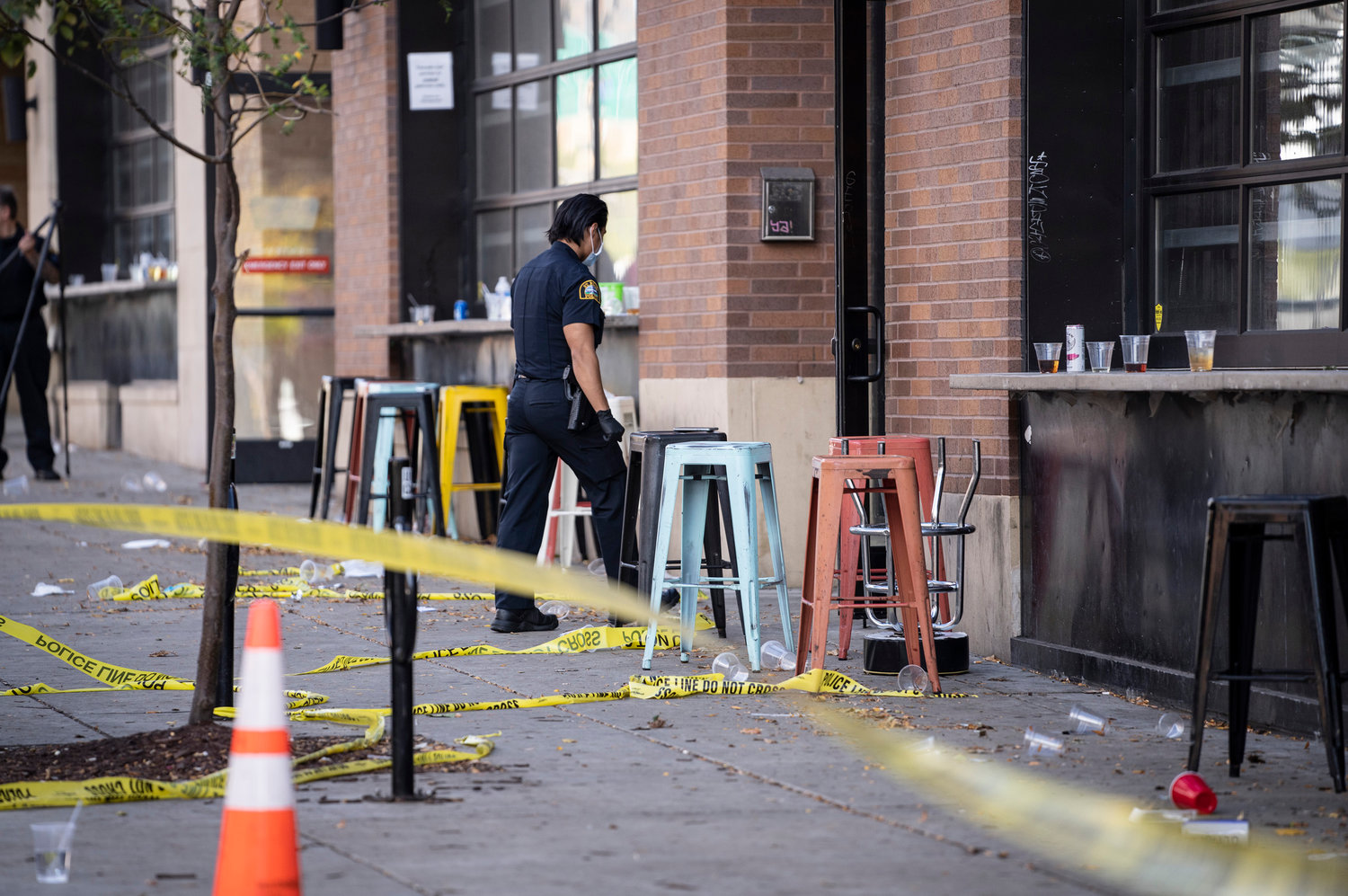 Investigators process the chaotic scene of a multiple shooting at the bar Truck Park in St. Paul, Minnesota, that happened after midnight on Sunday, Oct. 10, 2021. (Renee Jones Schneider/Minneapolis Star Tribune/TNS)