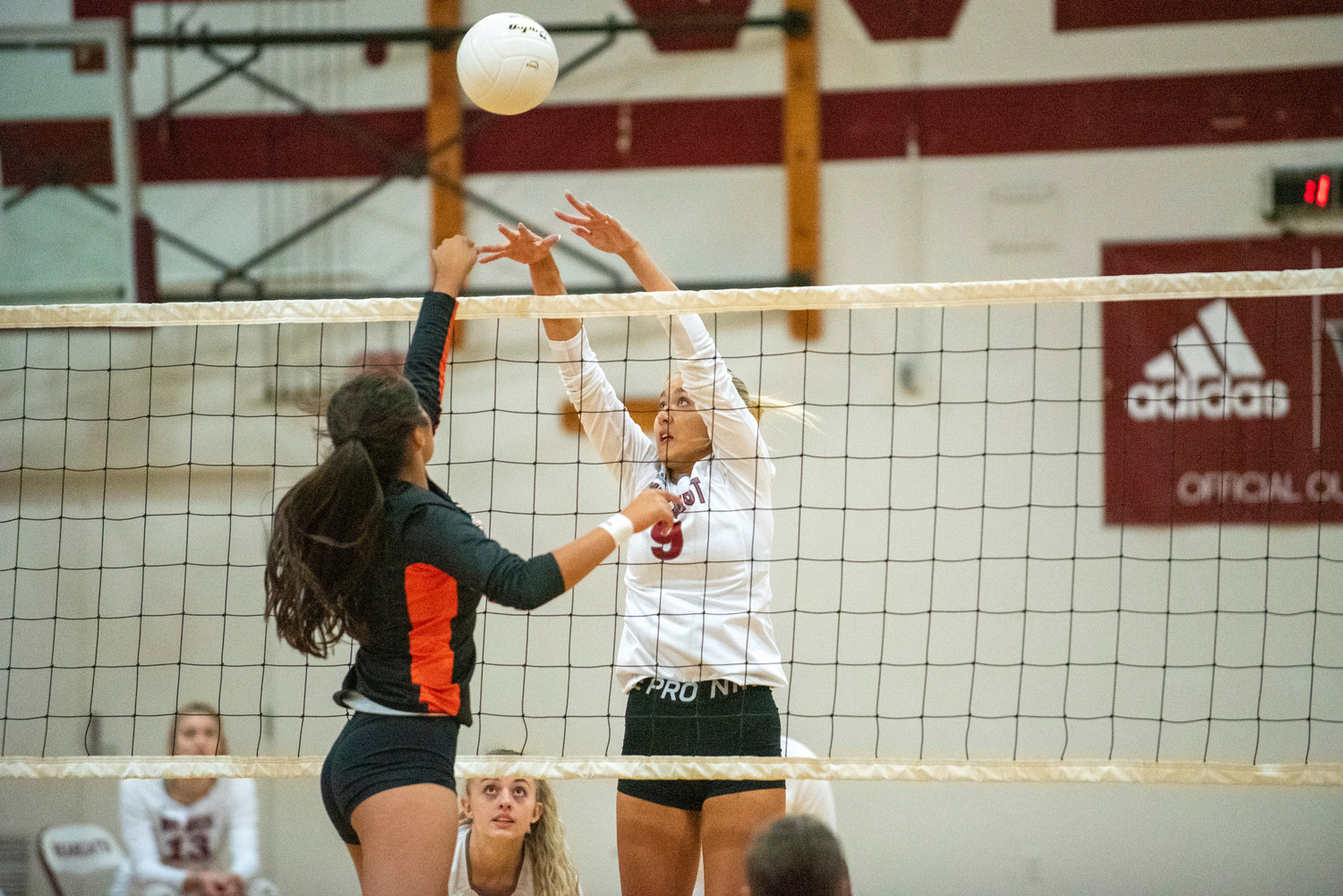 W.F. West's Ava Olsen (9) attempts to block a spike by Centralia's Makayla Chavez on Oct. 12, 2021.