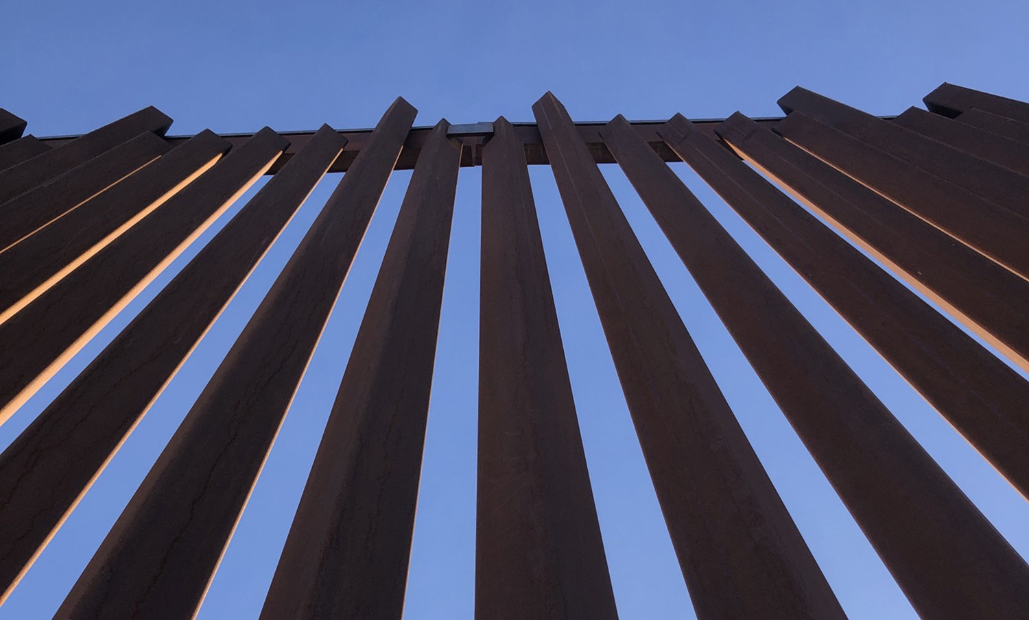 A new section of border wall constructed in a remote expanse of desert outside Yuma, Arizona, under the Trump administration. (Molly O'Toole/Los Angeles Times/TNS)