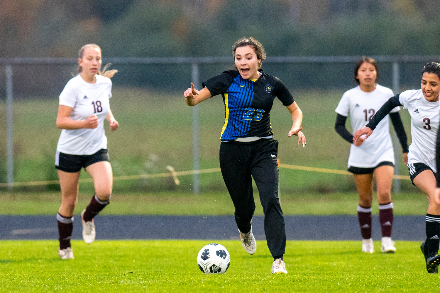 Adna senior Presley Smith (23) drives downfield against Raymond-South Bend on Oct. 13, 2021.