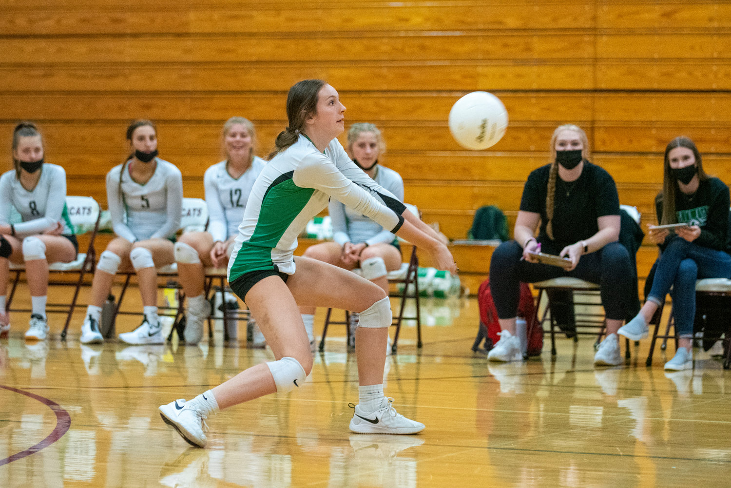 Tumwater's Kira Turcotte (11) gets on front of a W.F. West serve on Oct. 14, 2021.