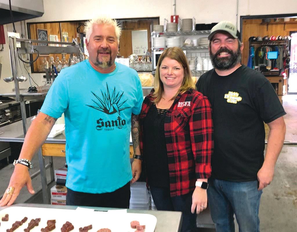 Guy Fieri appears at Dick’s Brewing Northwest Sausage and Deli with Julie and Dave Pendleton.