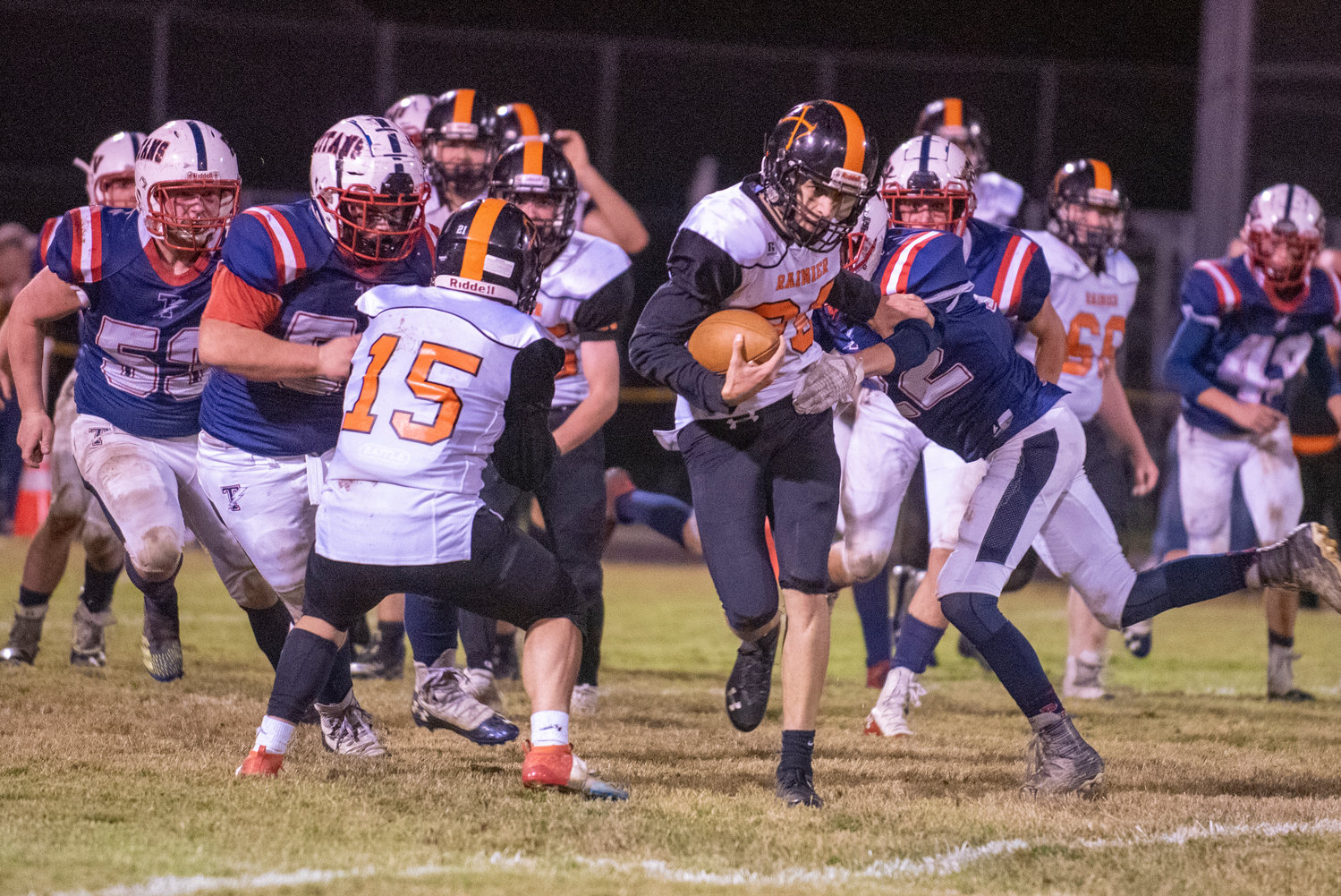 Rainier quarterback Ian Sprouffske (20) rushes up the middle against PWV on Oct. 15, 2021.