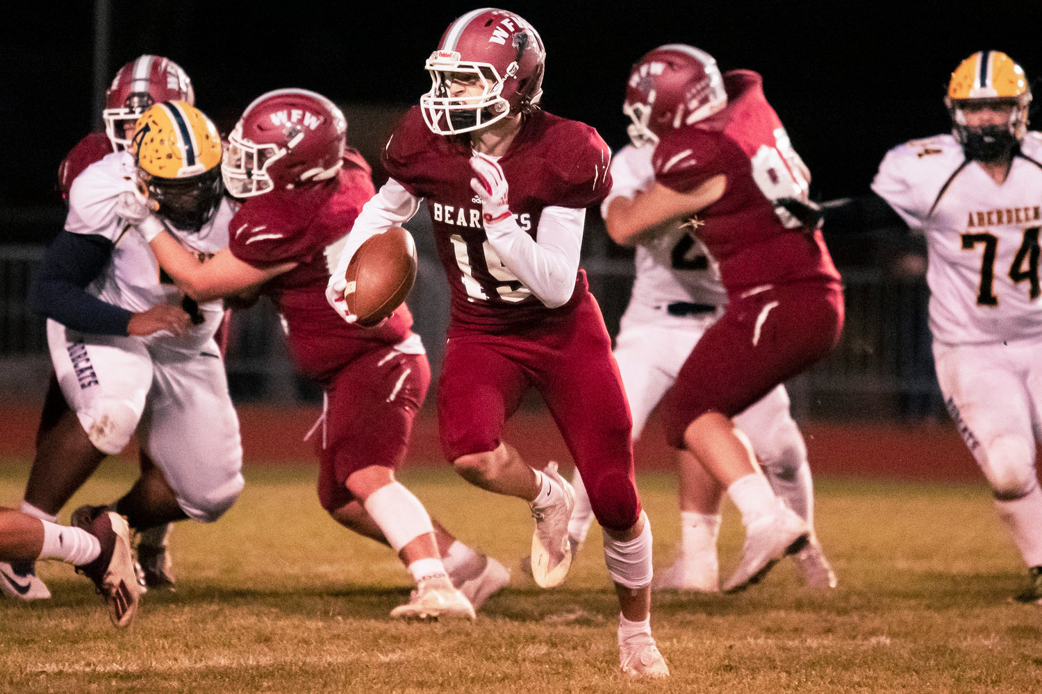 W.F. West’s Gage Brumfield (19) runs with the football during a game against Aberdeen Friday night at Bearcat Stadium in Chehalis.