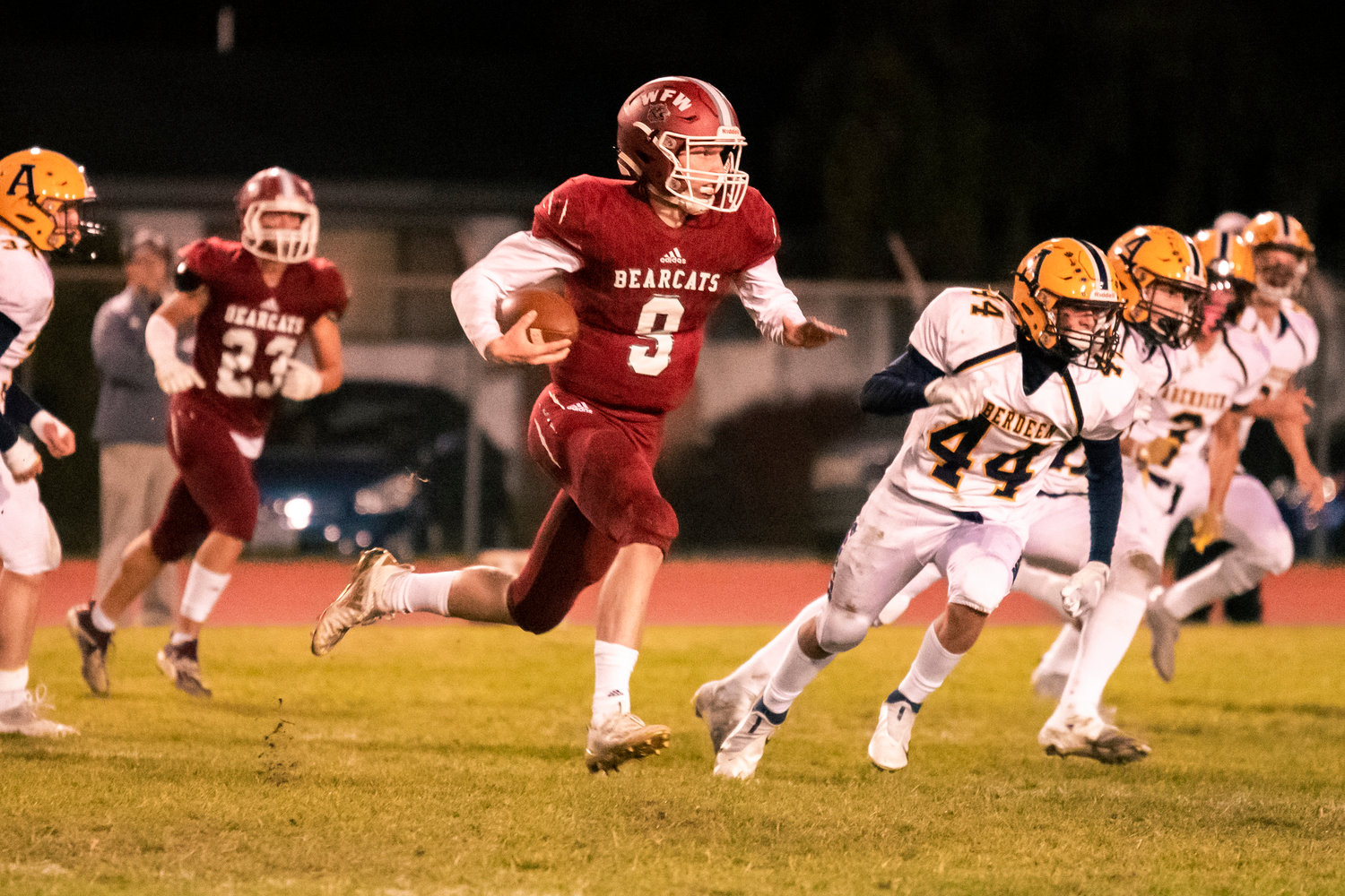 W.F. West’s Gavin Fugate (9) runs with the football during a game against Aberdeen Friday night at Bearcat Stadium in Chehalis.