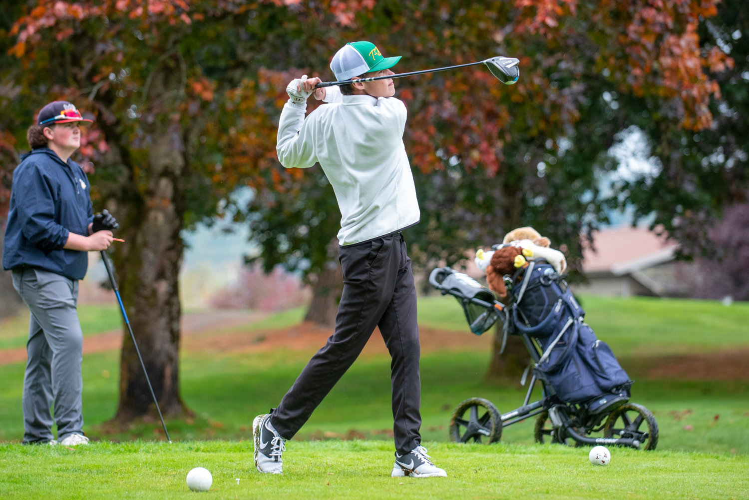 Tumwater's Gabe Johnston tees off on the 18th hole of the 2A Evergreen Conference championships at Riverside Holf Course on Oct. 18, 2021.
