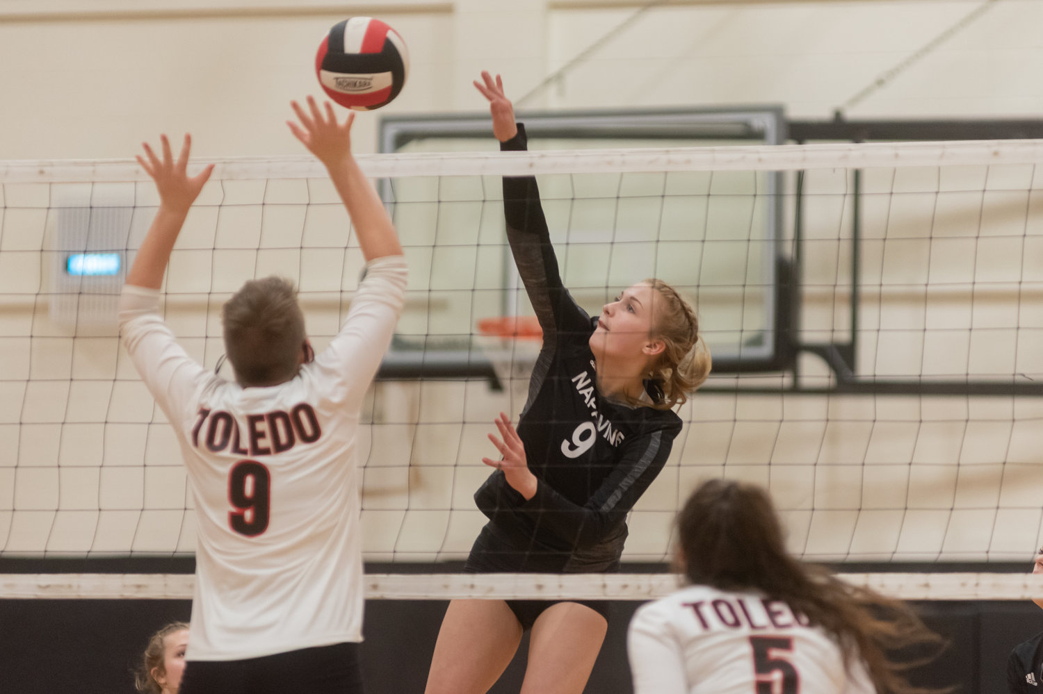 Napavine sophomore middle Keira O'Neill spikes down a kill against Toledo Oct. 19.