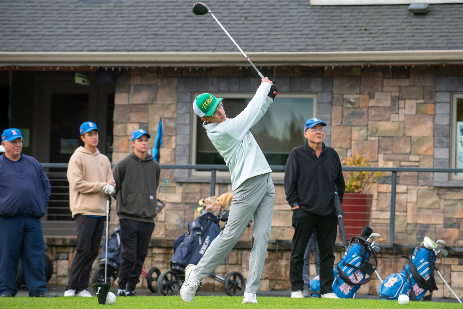 Tumwater's Kaden Clark tees off on Day One of the 2A District 4 Boys Golf Tournament at Riverside Golf Course in Chehalis on Oct. 20, 2021.