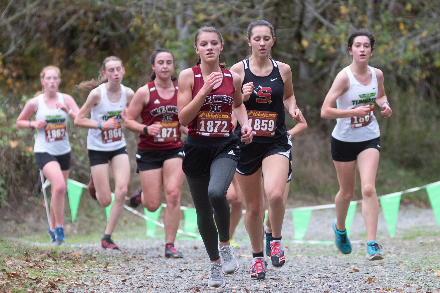 W.F. West freshman Mercedes Ricks leads a pack of runners at the 2A Evergreen Championships at Pioneer Park Oct. 20.