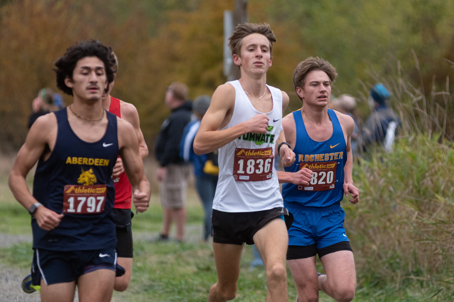 Tumwater's John Hoffer, Rochester's Levi Jennings, and Aberdeen's Julian Campos lead the pack at the 2A Evergreen Championships Oct. 20.