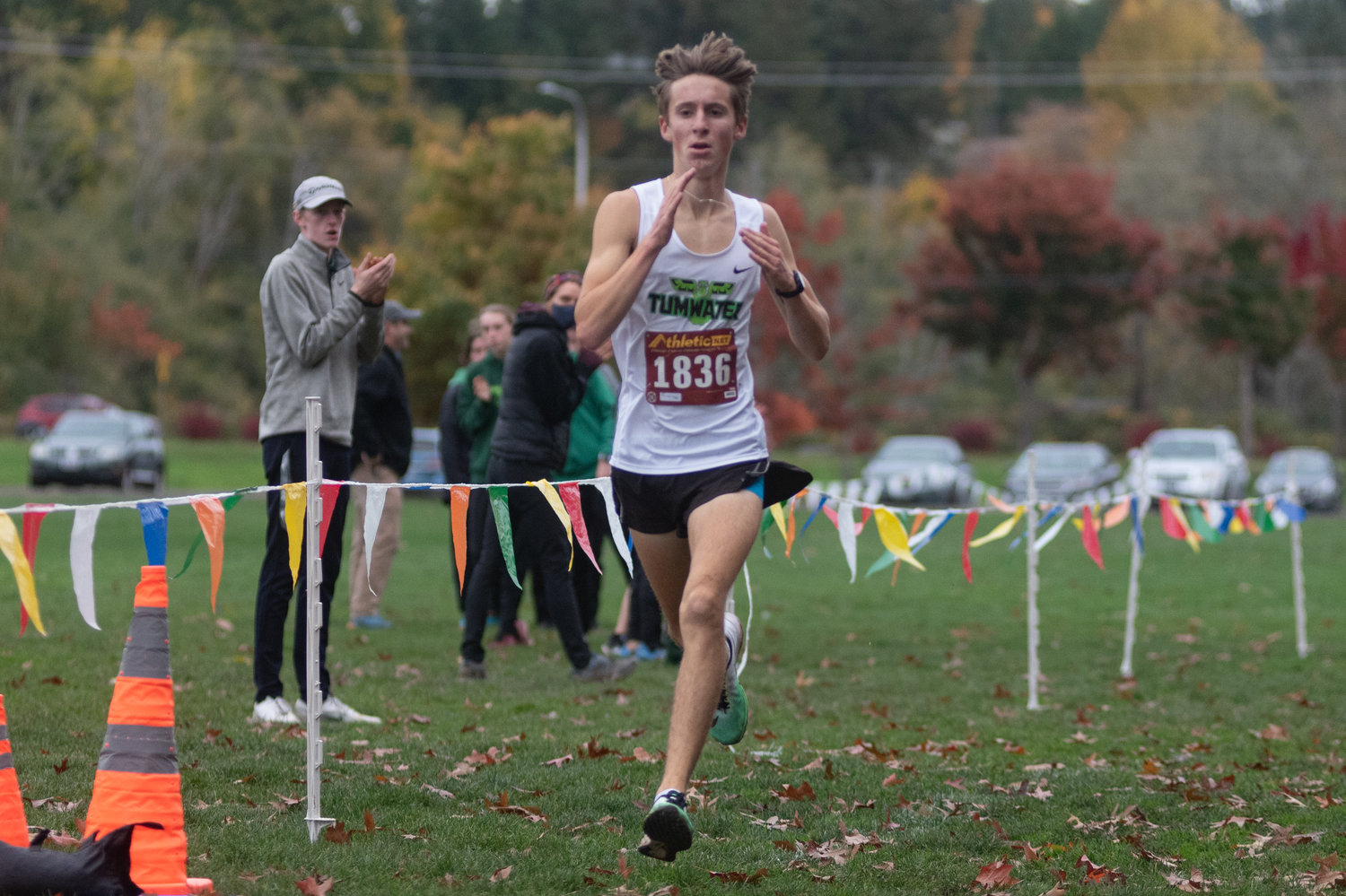 Tumwater John Hoffer crosses the finish line first at the 2A Evergreen Championships at Pioneer Park Oct. 20, 2021.