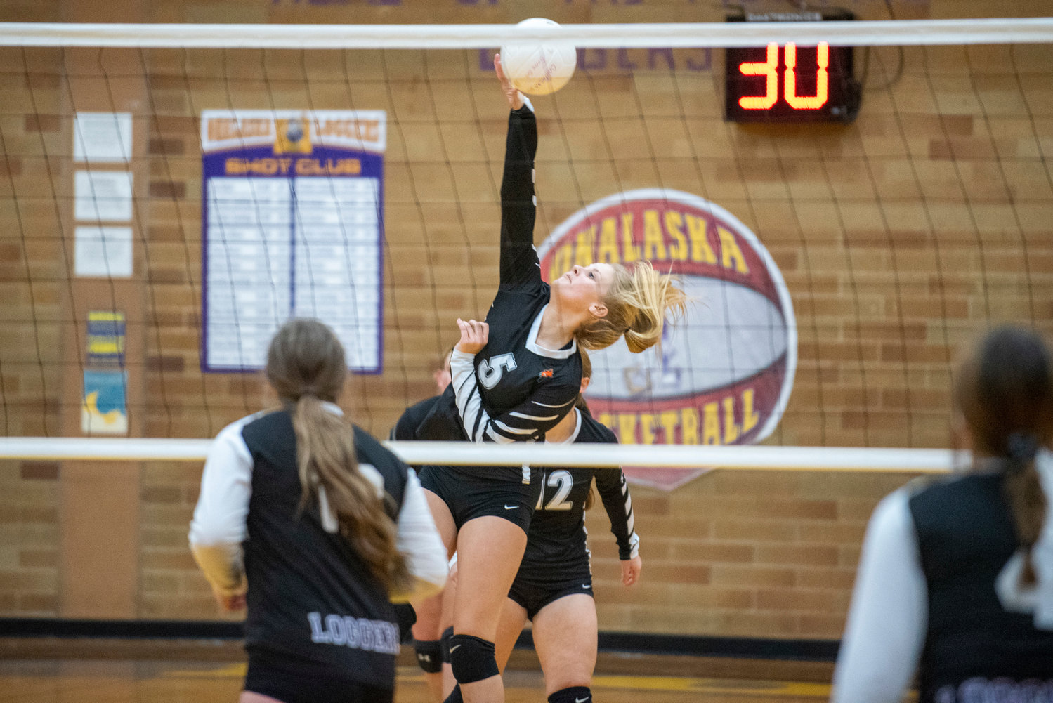 Morton-White Pass' Breejah Townsend hammers a spike to Onalaska on Monday, Oct. 25, 2021.