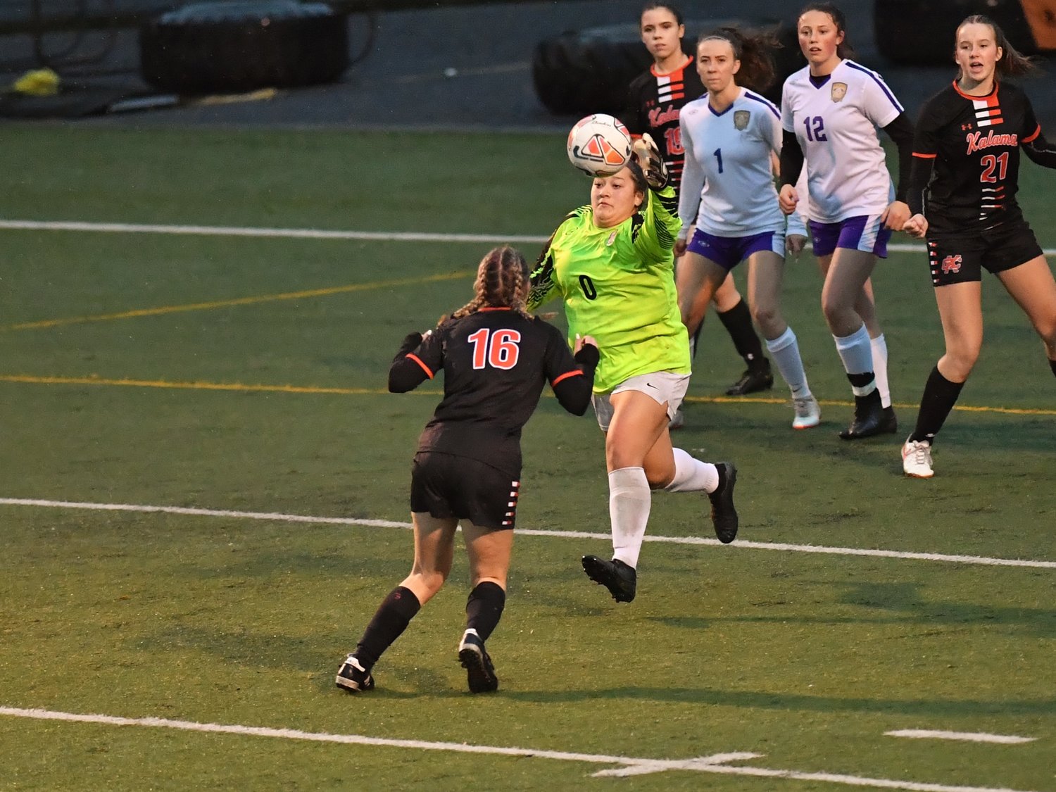 Onalaska keeper Alex Cleveland-Barrera gets to a ball before a Kalama forward in the Loggers 1-0 win Oct. 27. Cleveland-Barrera finished with 12 saves in the winning effort.