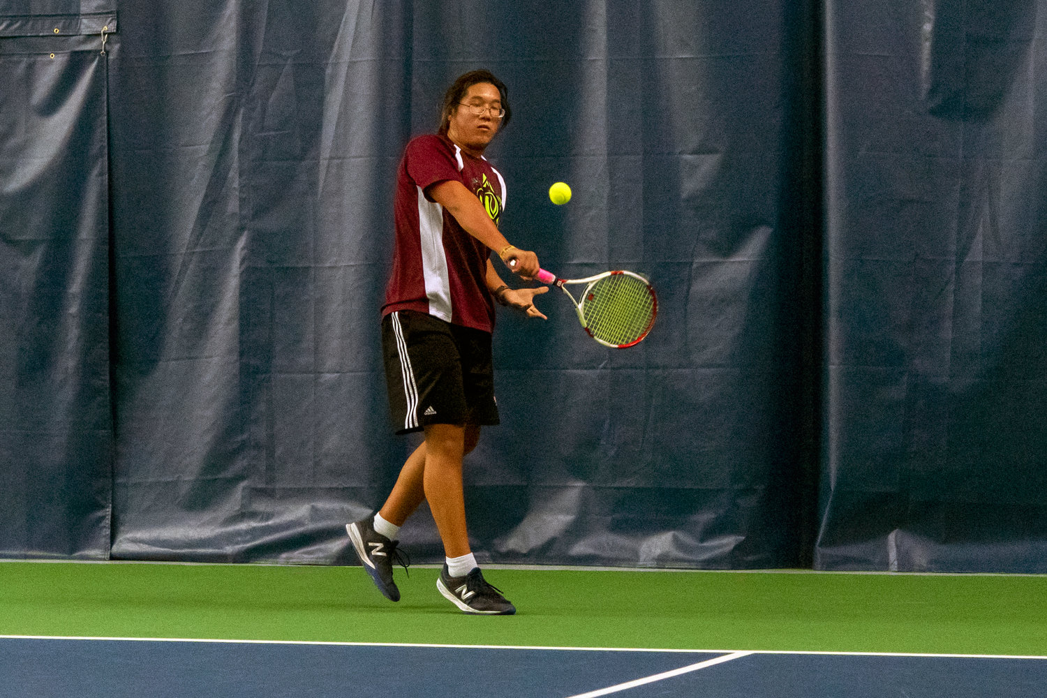 W.F. West's Justin Chung competes in the 2A District 4 singles championship Oct. 28 at Steamboat Tennis and Athletic Club in Olympia.