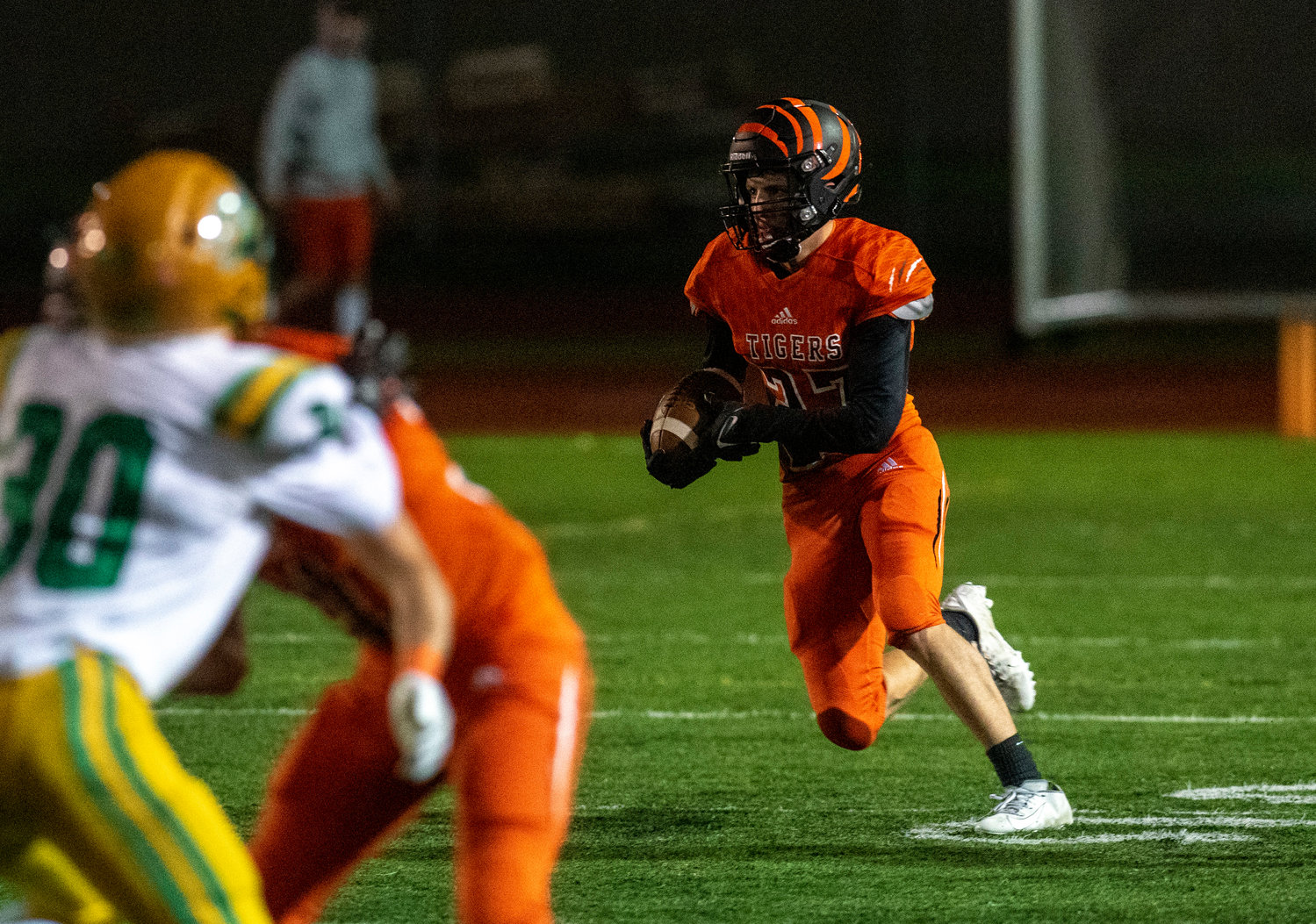 Centralia’s Anthony Saucedo (27) returns a kickoff against Tumwater Oct. 29.