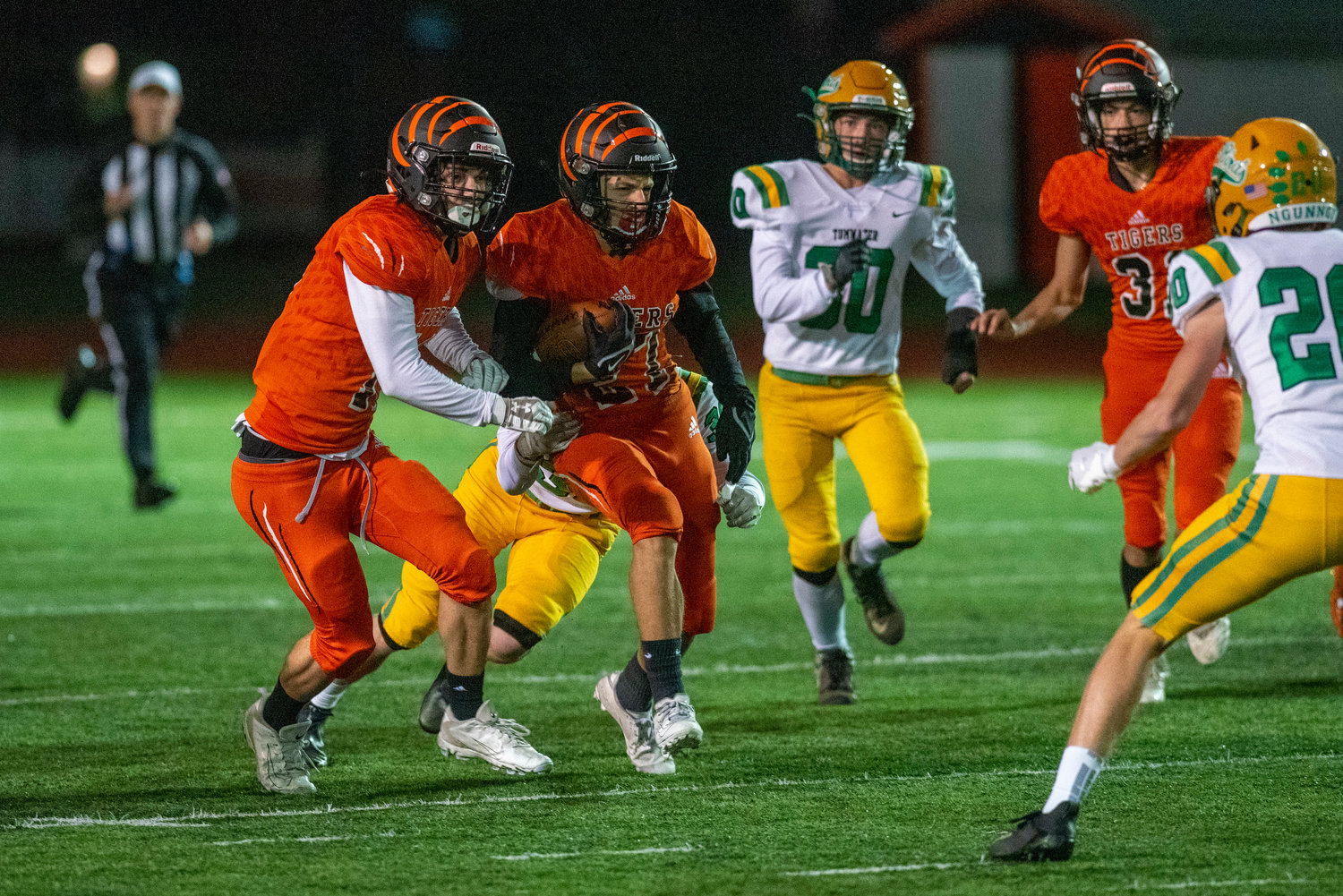 Centralia running back Anthony Saucedo (27) looks for running room at home against Tumwater Oct. 29.