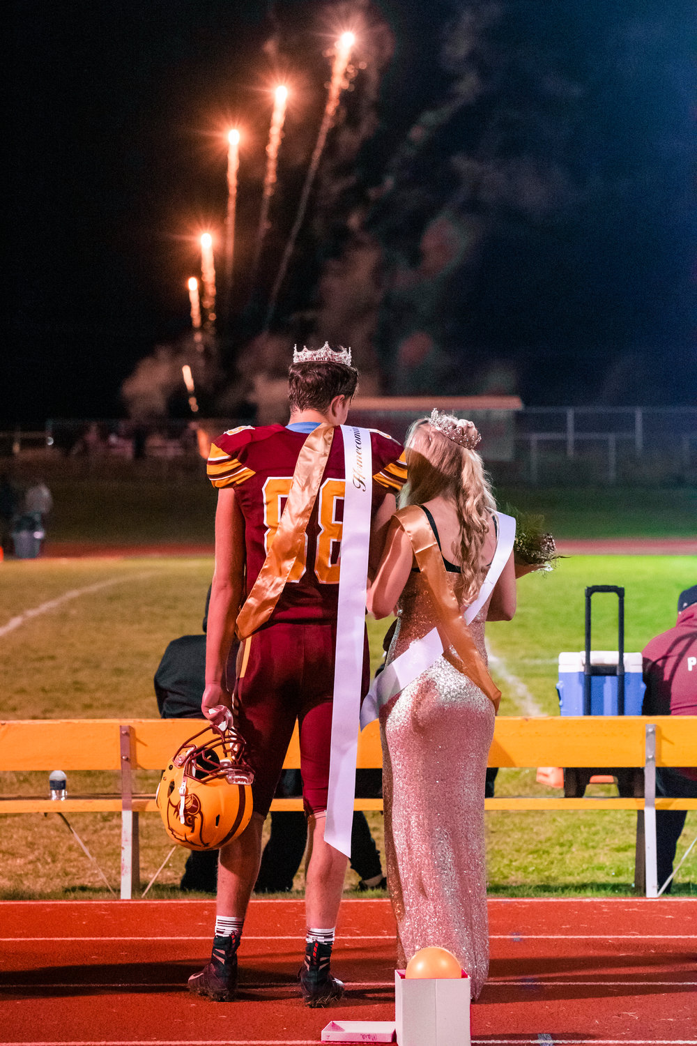 Fireworks explode in Winlock at halftime after the Homecoming King and Queen were announced Friday night.