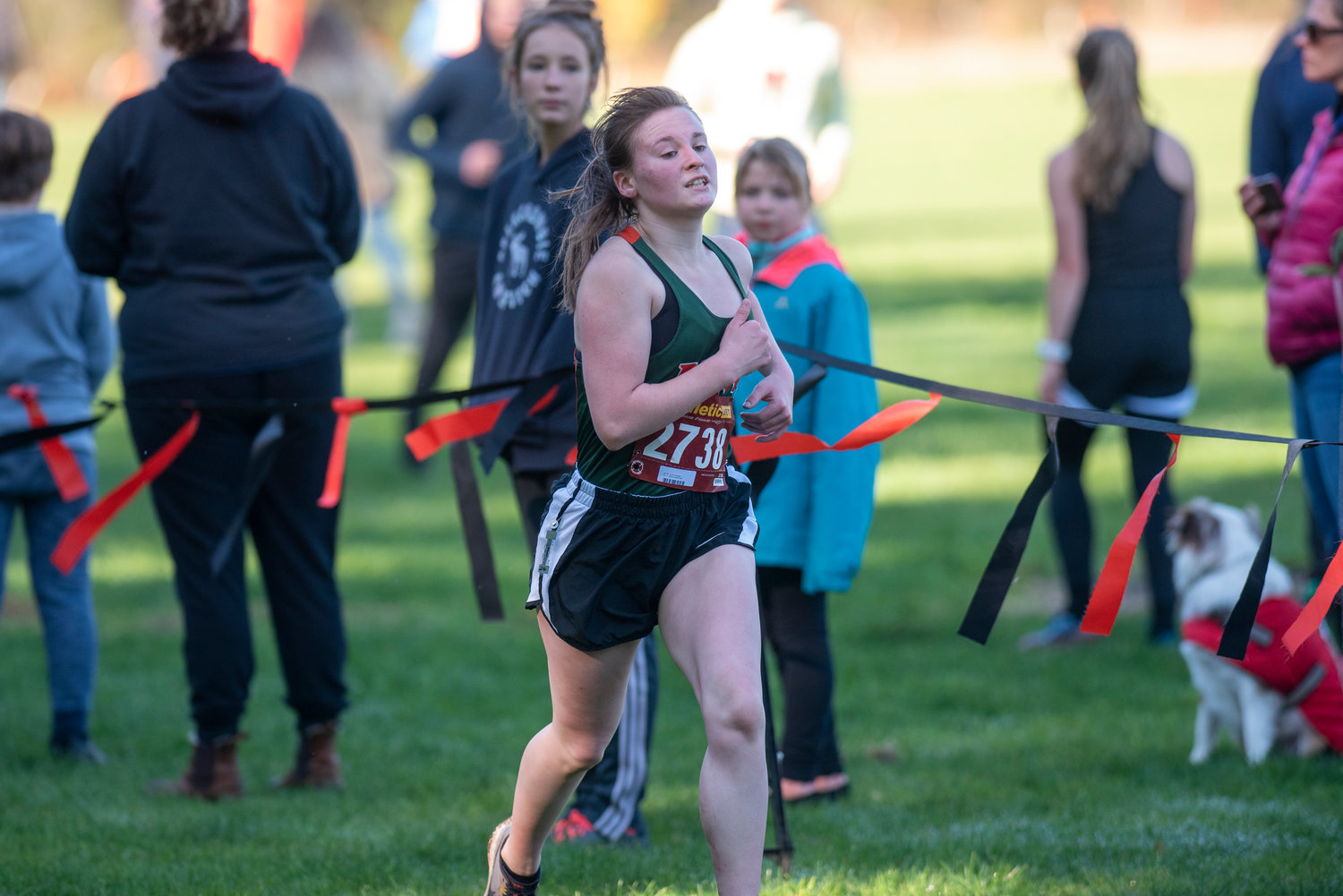 Morton-White Pass junior Ayricka Hughes crosses the finish line in 10th place to qualify for state at the 2B District 4 girls cross country championships Saturday in Rainier.
