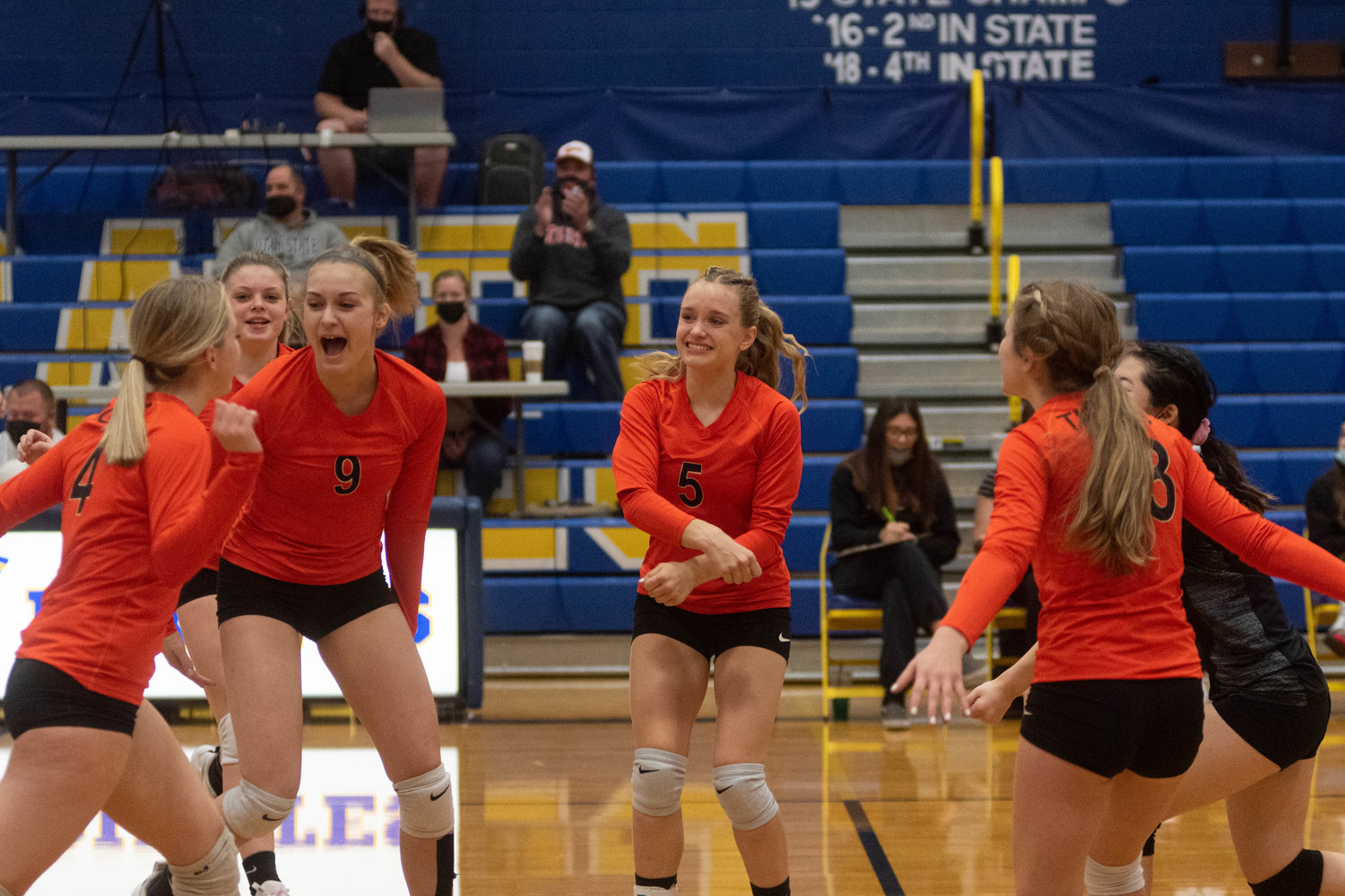Napavine celebrates a point in its four set loss to Ocosta in the opening round of the District 4 Tournament in Adna Oct. 30.