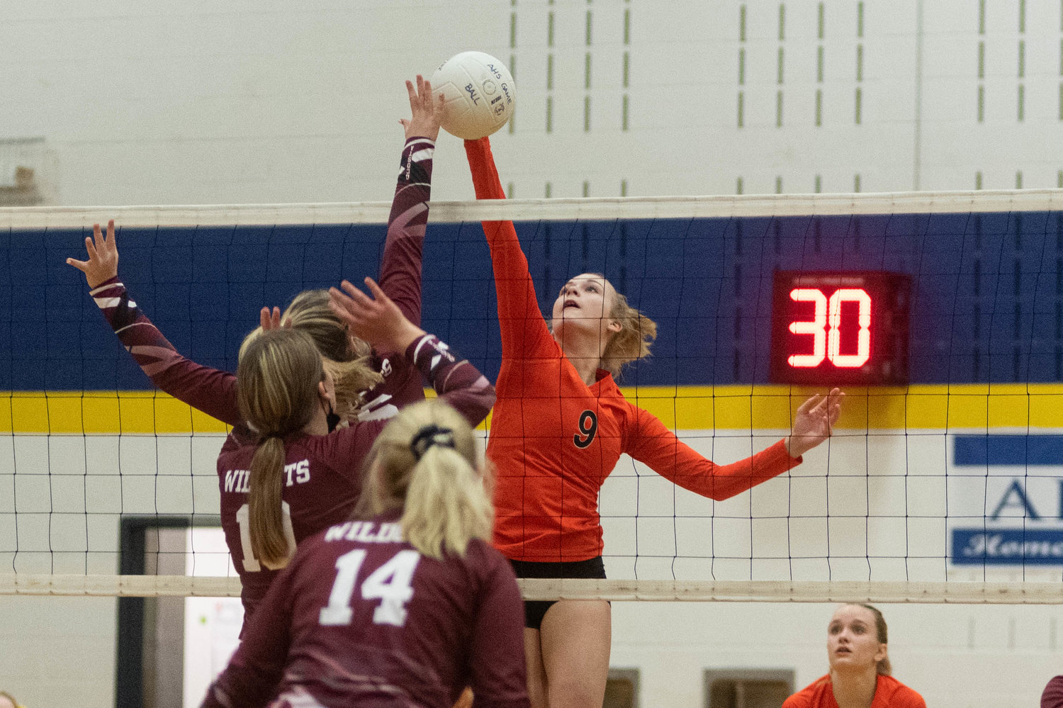 Napavine sophomore middle Keira O'Neill spikes a ball over the net in the Tigers four set loss to Ocosta in the opening round of the District 4 Tournament in Adna Oct. 30.
