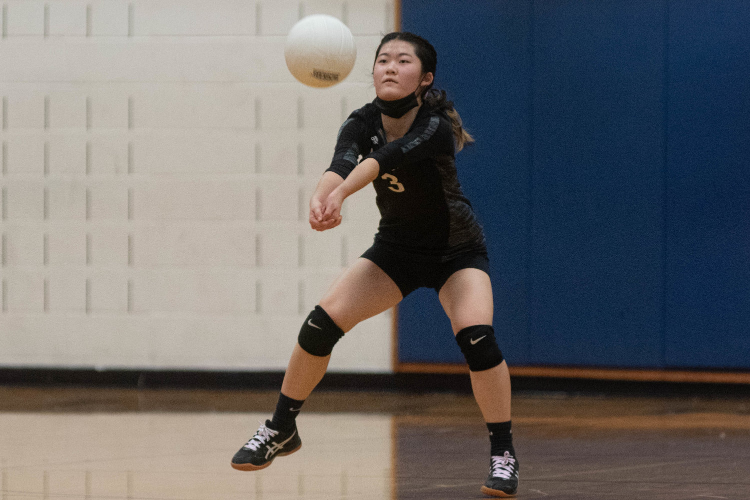 Napavine freshman defensive specialist Emily Kang recieves a serve in a 3-1 loss to Ocosta in the opening round of the District 4 Tournament in Adna Oct. 30.
