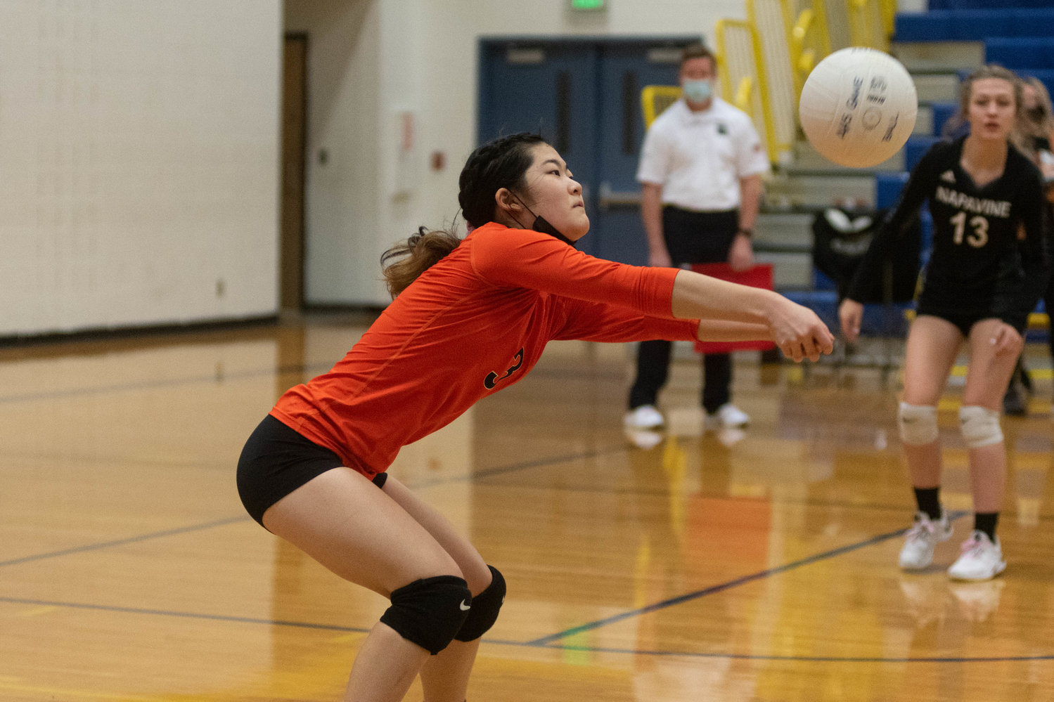 Napavine freshman Emily Kang digs up a serve against Ilwaco in a losers bracket District 4 playoff game against Ilwaco in Adna Oct. 30.