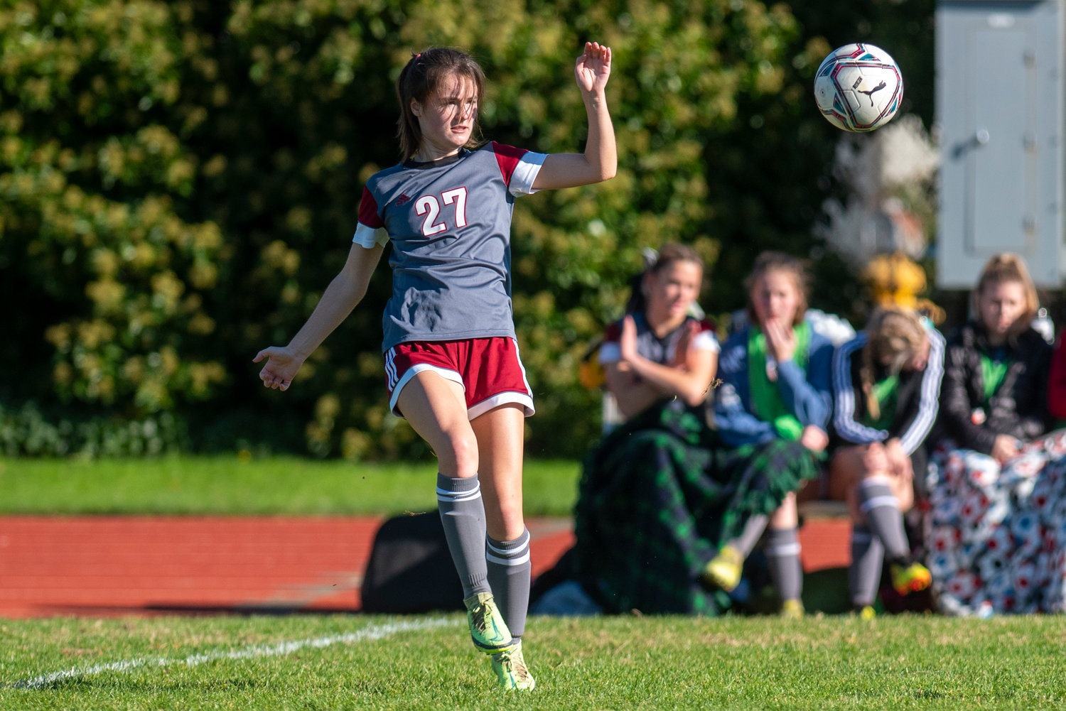 W.F. West senior Audrey Toynbee (27) shoots a pass to a teammate against Ridgefield in districts Oct. 30.