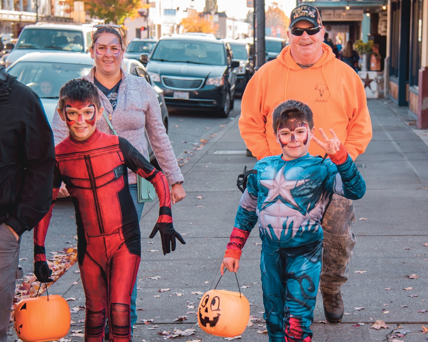 Superheroes pose for a photo in downtown Centralia on Saturday in 2021.