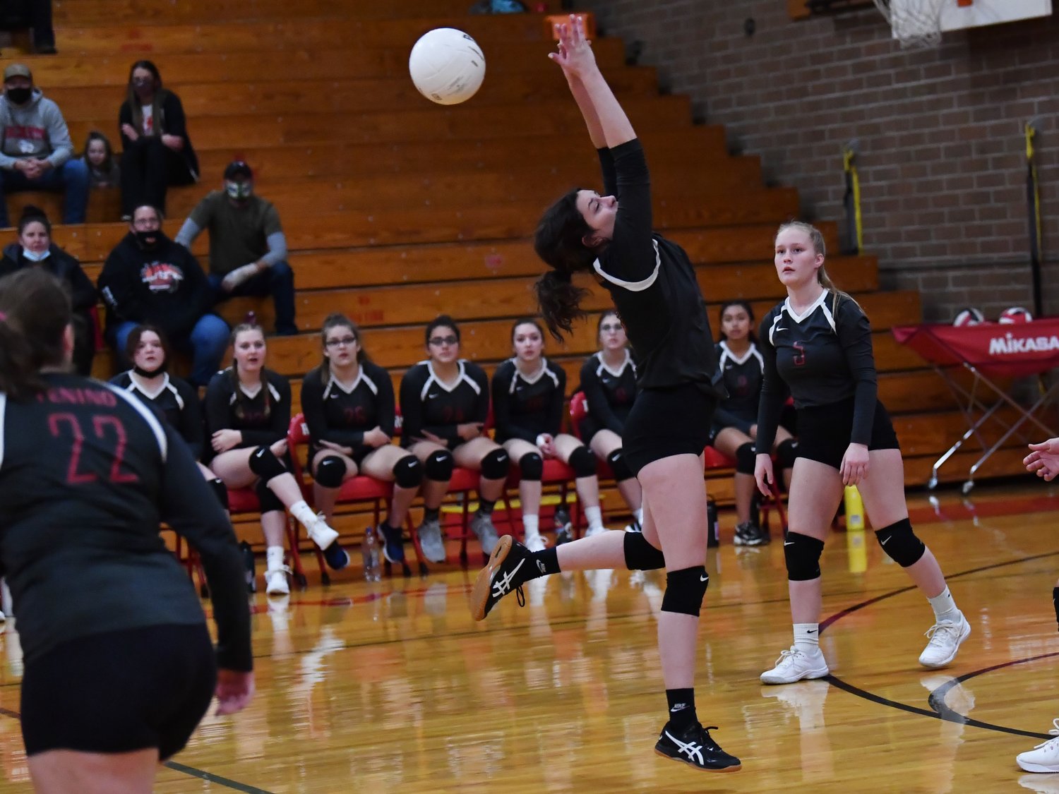 Tenino senior Brittany Maynard keeps a ball alive in a loss to Castle Rock in the opening round of the 1A District 4 playoffs Nov. 3.