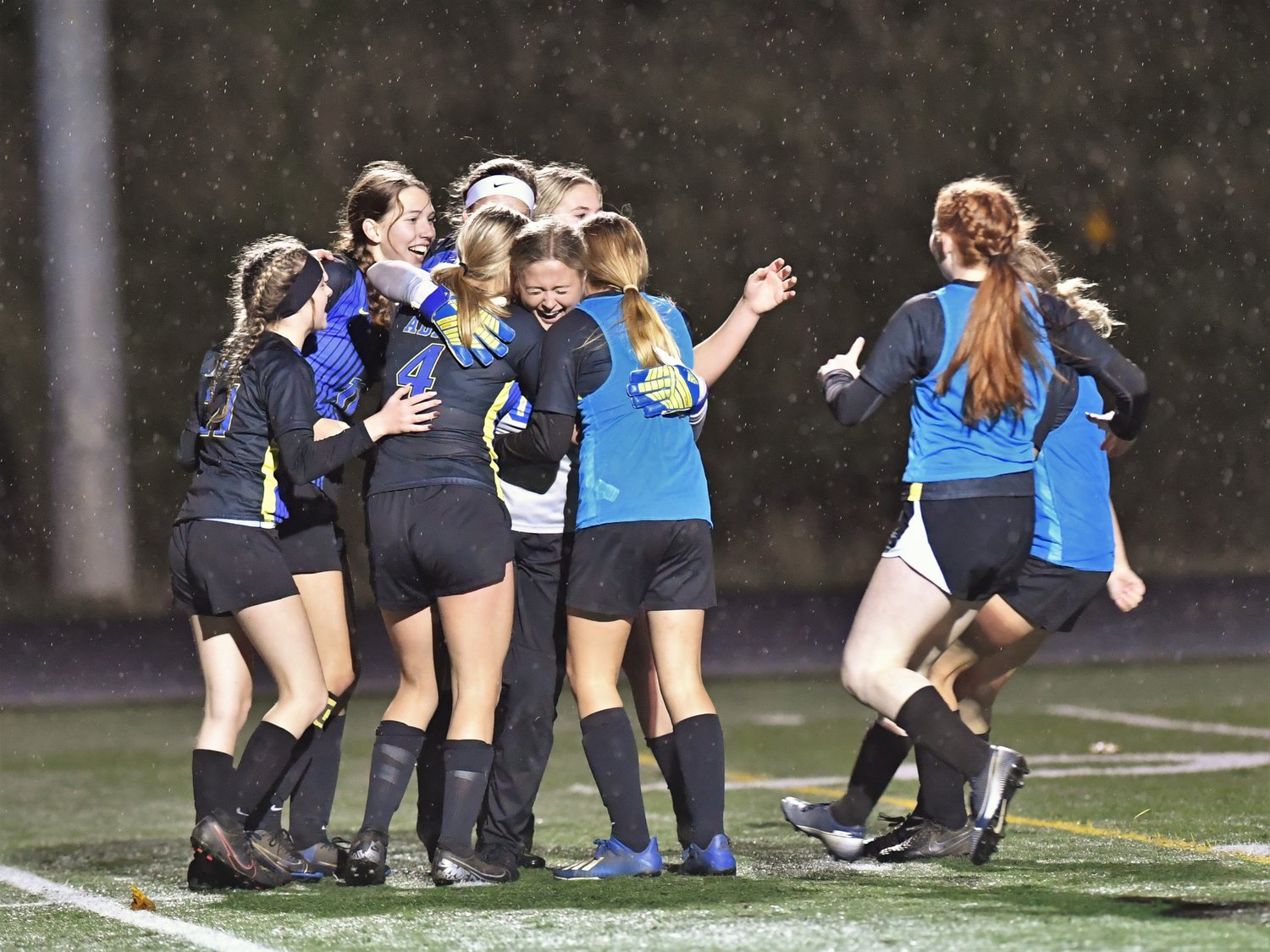 Adna players celebrate after beating Onalaska in the district semfinals in Kalama Nov. 4.