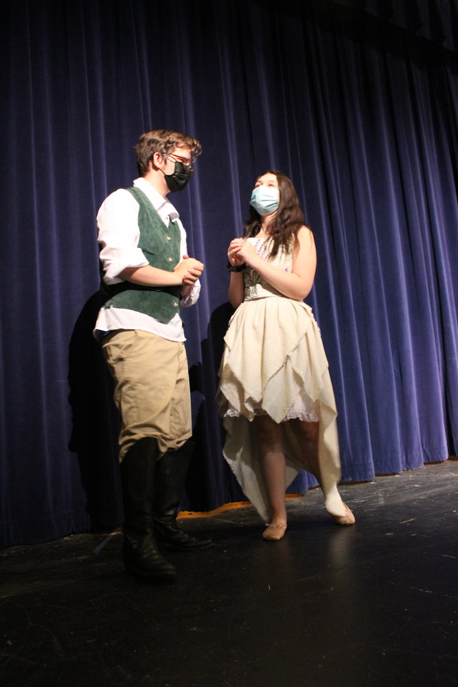 Miranda, portrayed by Aleena Hurd and Fernando, portrayed by Brandon Ryniker, meet and fall in love in "William Shakespeare's Tempest" opening Nov. 19 at Rochester High School.