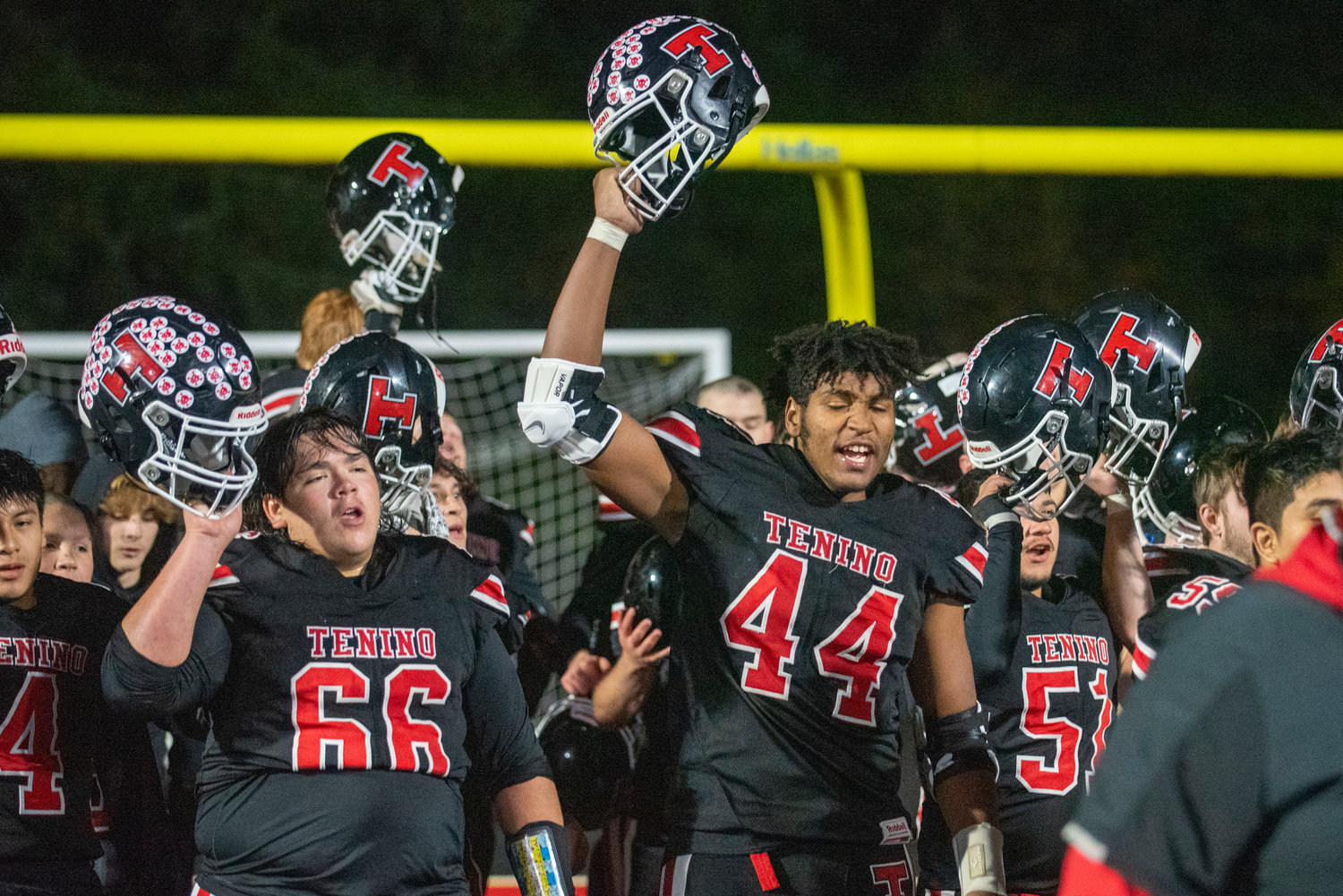 Tenino football celebrates after defeating Castle Rock 56-0 in the district playoffs Friday, Nov. 5.