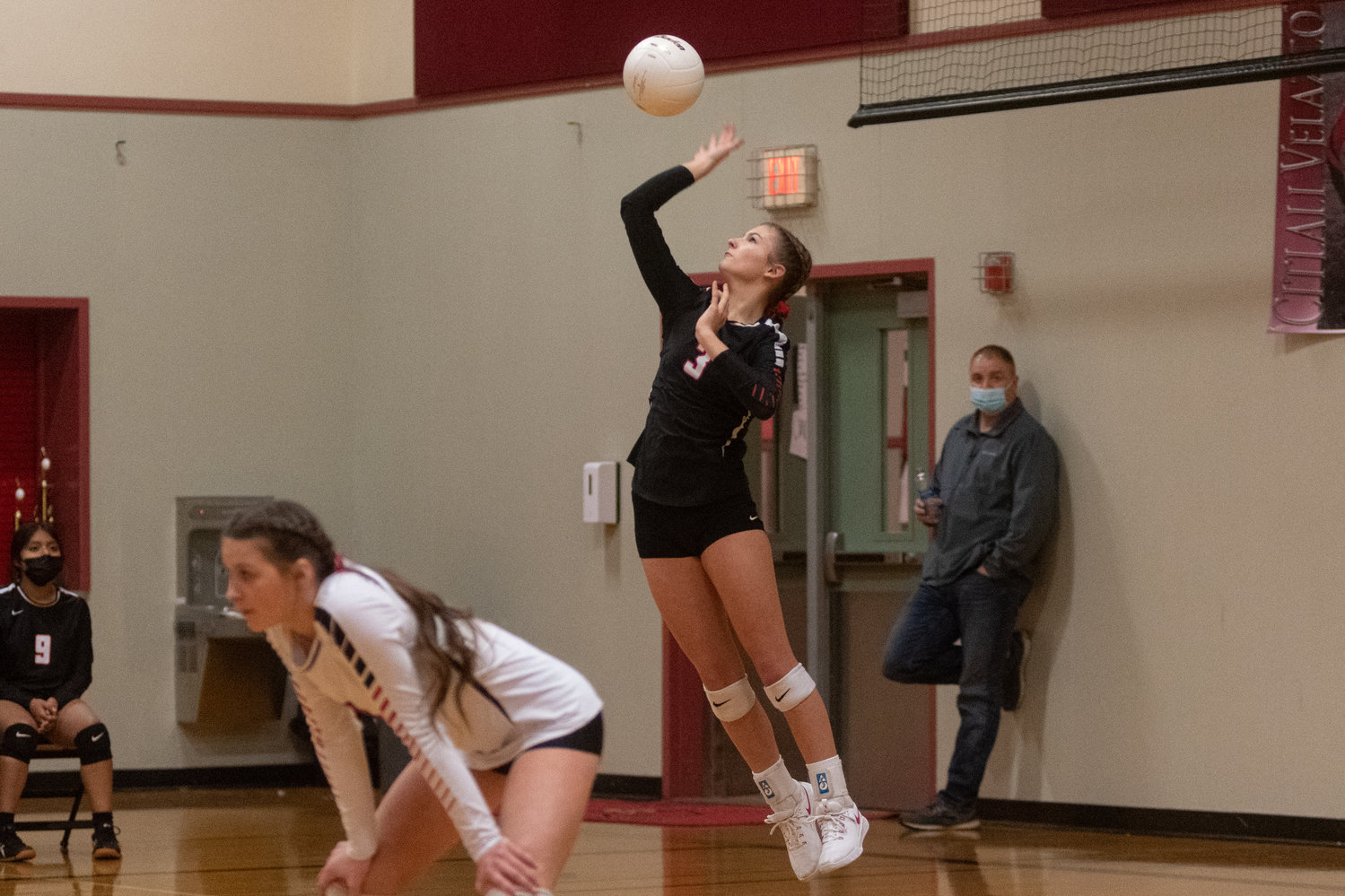 Mossyrock freshman setter Erin Cournyer  serves the ball against Naselle in the 1B District 4 championship in Winlock Nov. 6.