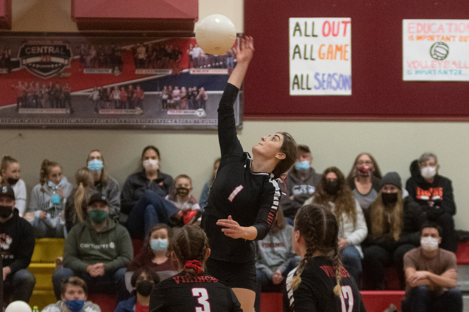 Mossyrock junior Payton Torrey slams down a spike against Naselle in the 1B District 4 title game in Winlock Nov. 6.