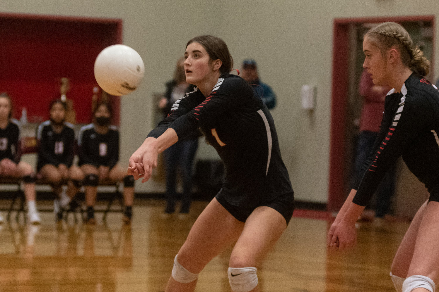 Mossyrock junior outside hitter Payton Torrey digs up a serve against Naselle in the 1B District 4 title game in Winlock Nov. 6.