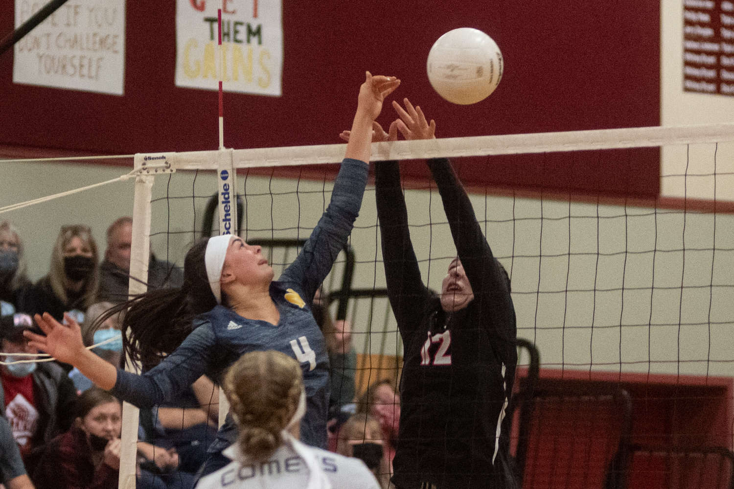 Naselle junior Lauren Katyryniuk tips a ball past a Mossyrock blocker in the 1B District IV title game in Winlock Nov. 6.