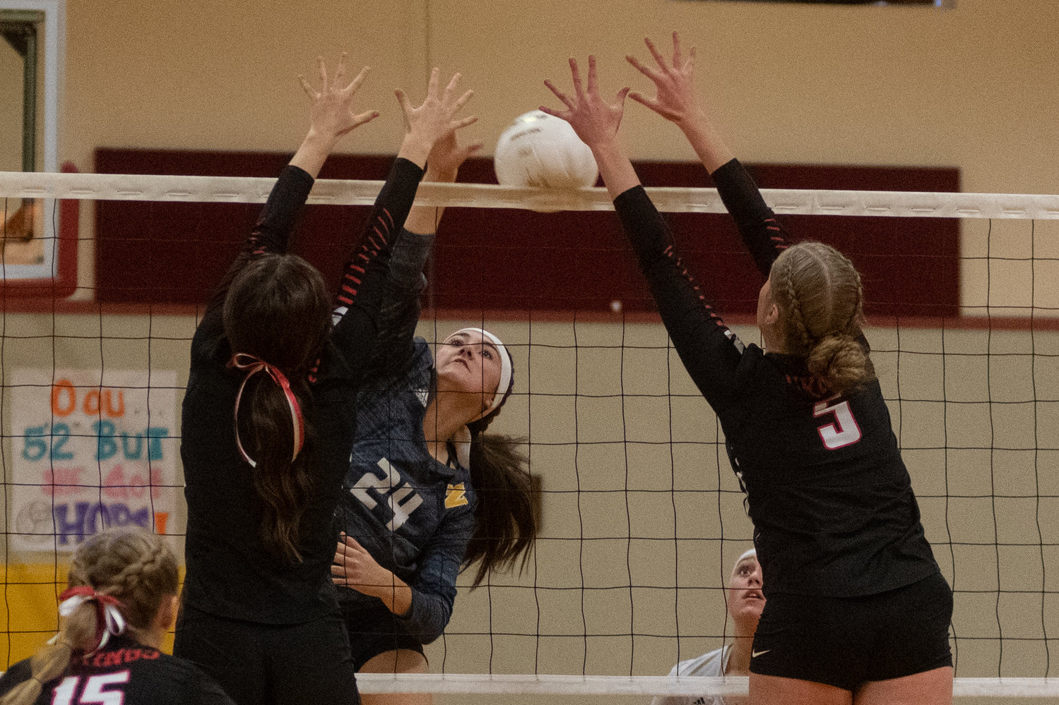 Naselle junior middle Delaney Kragerud hits into a block against Mossyrock at the 1B District title game in Winlock Nov. 6.