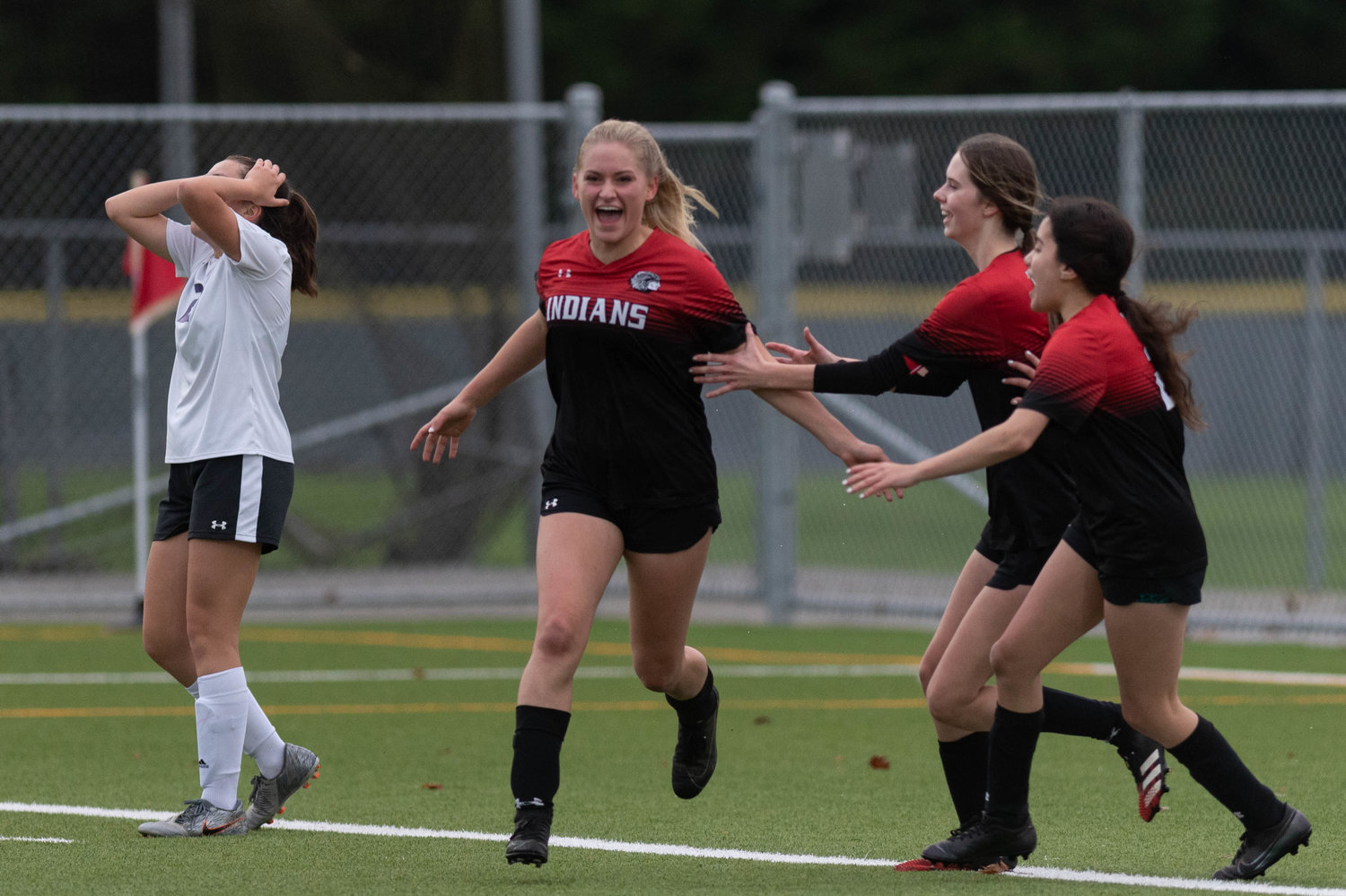 Vanesa Rodriguez celebrates her goal against Friday Harbor in the opening round of the WIAA 2B soccer tournament in Black Hills Nov. 10.