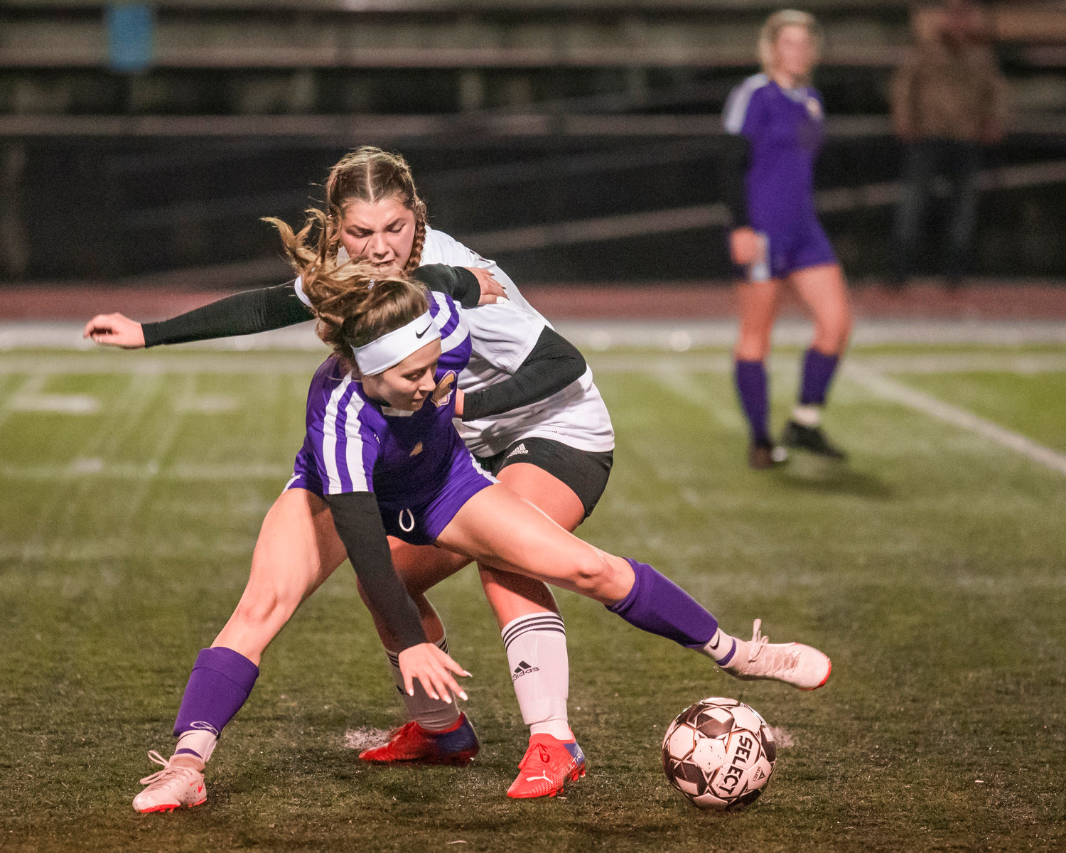 Onalaska’s Cierra Russ (1) fights for possession of the ball during a game against Reardan in Centralia Wednesday night.