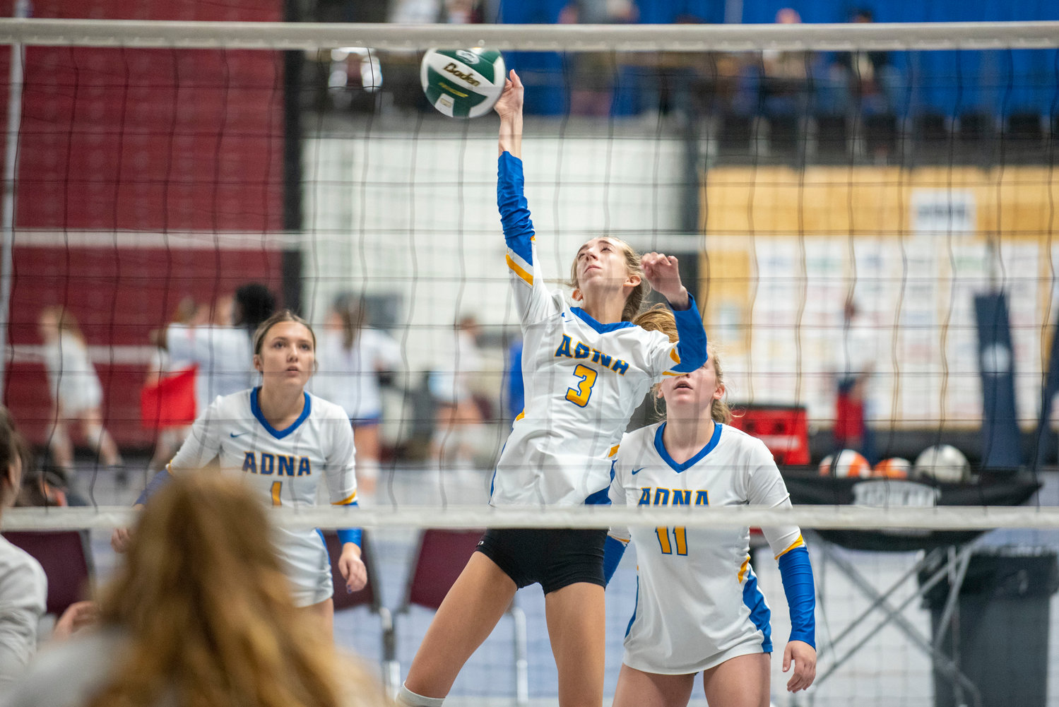 Adna’s Miriam Wilson (3) attacks Walla Walla Valley Academy during the first round of the 2B state volleyball tournament Thursday in Yakima.