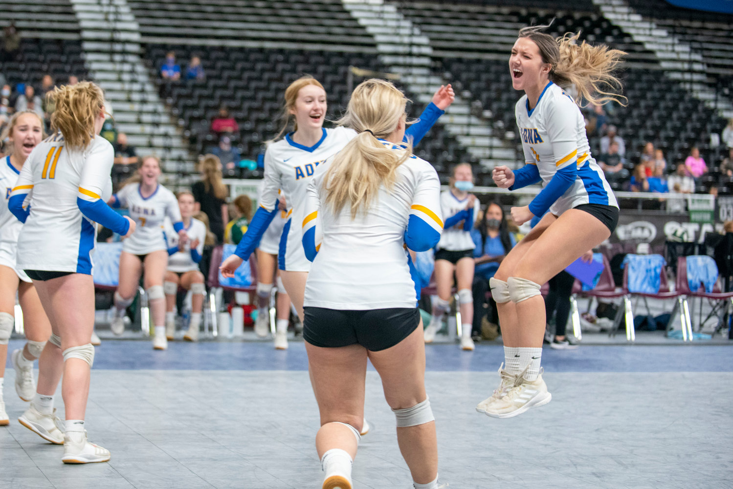 Adna’s Alyssa Davis, right, jumps in celebration after the Pirates score against Walla Walla Valley Academy on Thursday.