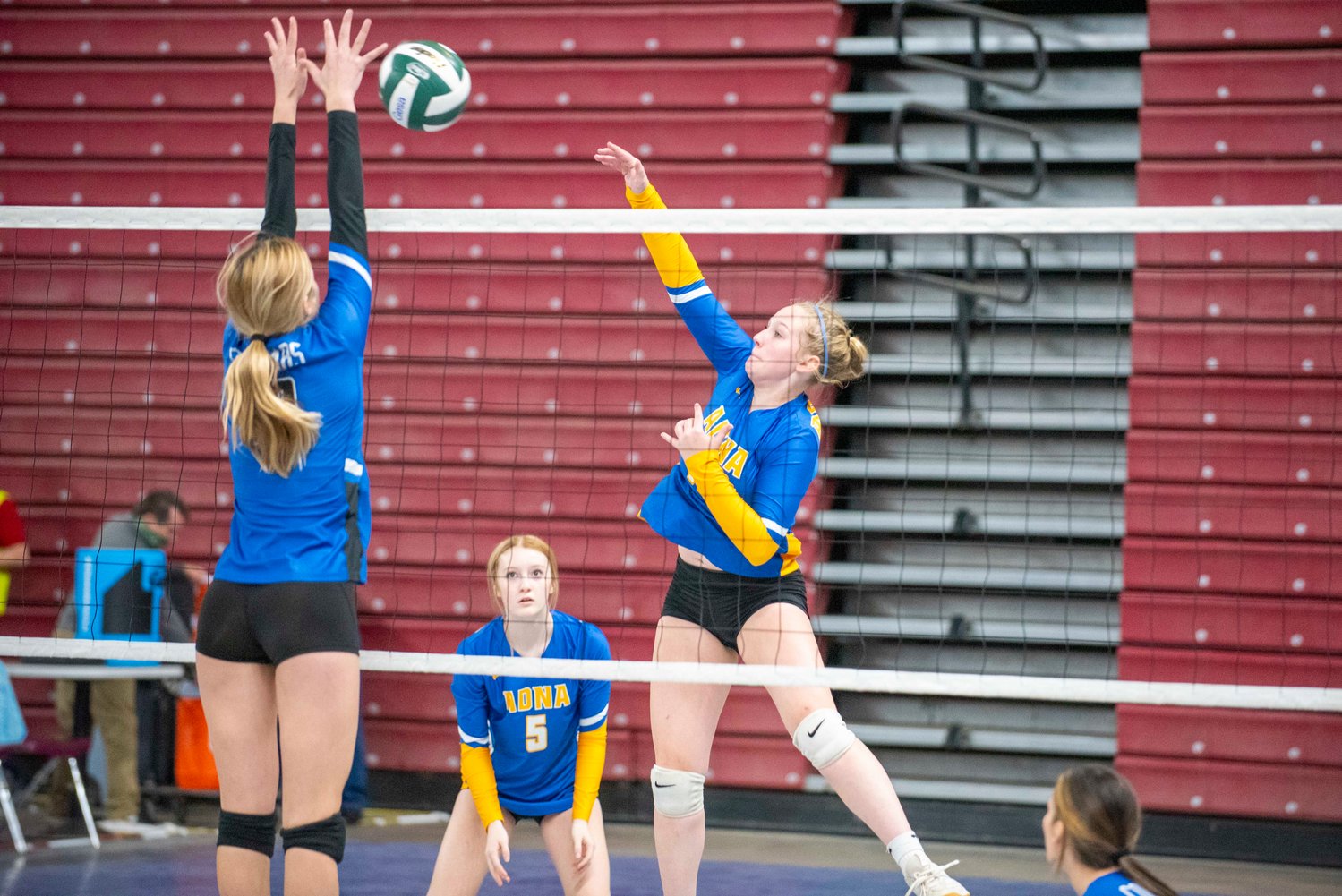Adna’s Kendall Humphrey (11) spikes against Warden in a loser-out match Thursday in Yakima