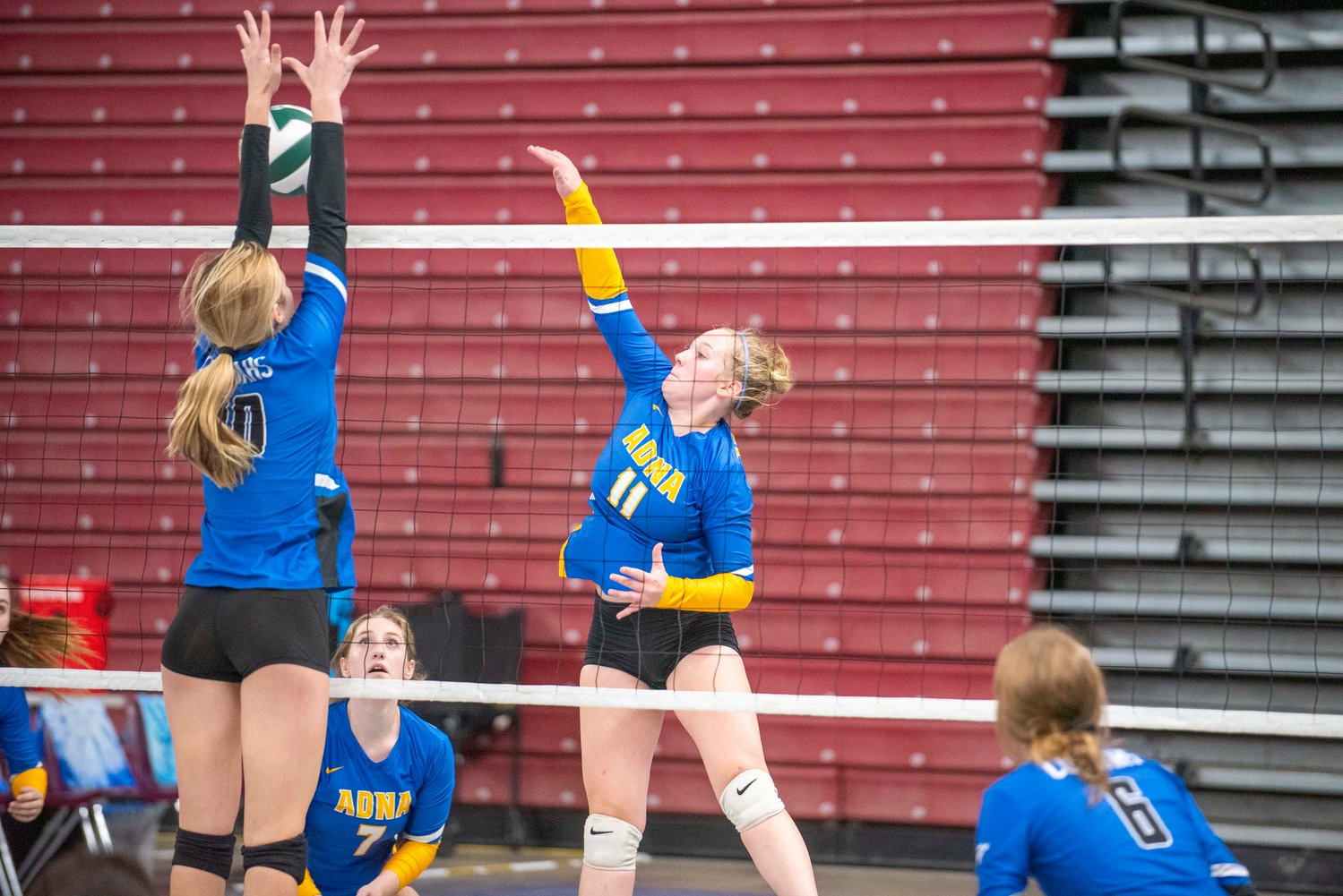 Adna’s Kendall Humphrey (11) spikes against Warden in a loser-out match Thursday in Yakima